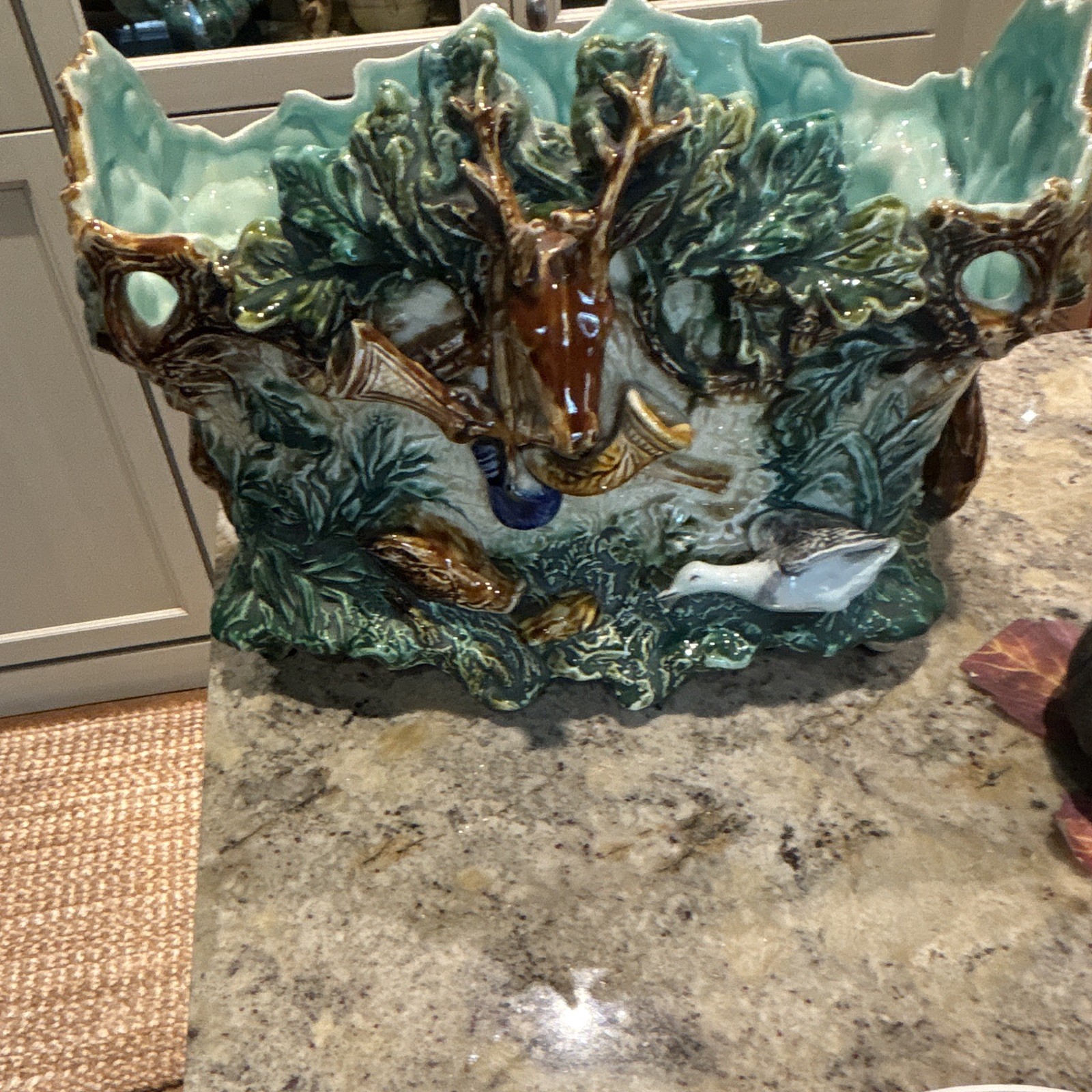 This antique late-19th-century French Majolica (Barbotine) hunting-scene jardini This antique late-19th-century French Majolica (Barbotine) hunting-scene jardini