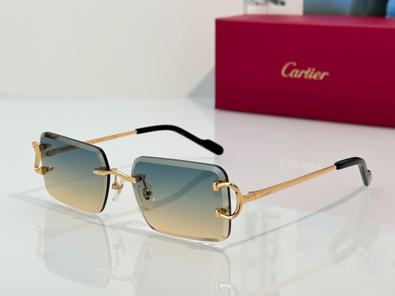 CARTIER CT1828O Gold Rimless Rectangle Sunglasses Blue Yellow Gradient Lenses CARTIER CT1828O Gold Rimless Rectangle Sunglasses Blue Yellow Gradient Lenses