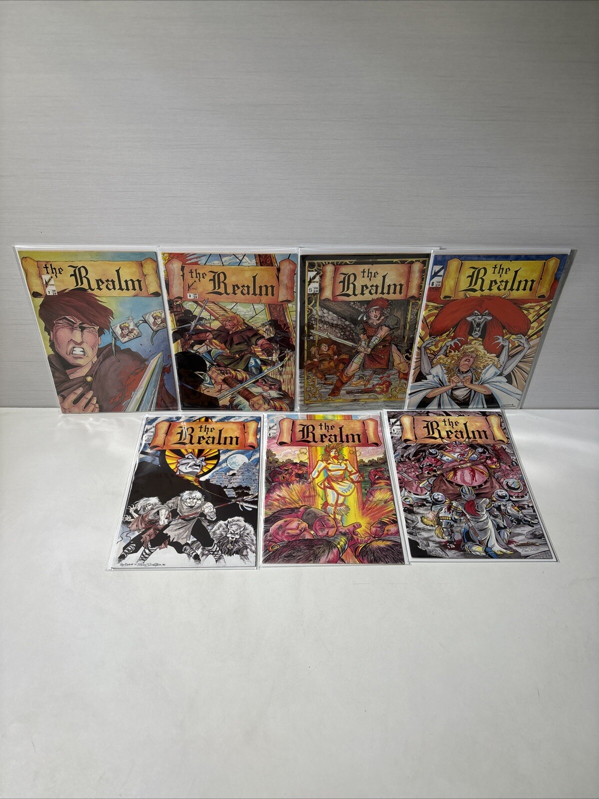 THE REALM 2 3 5 6 7 8 9 COMICS THE REALM 2 3 5 6 7 8 9 COMICS