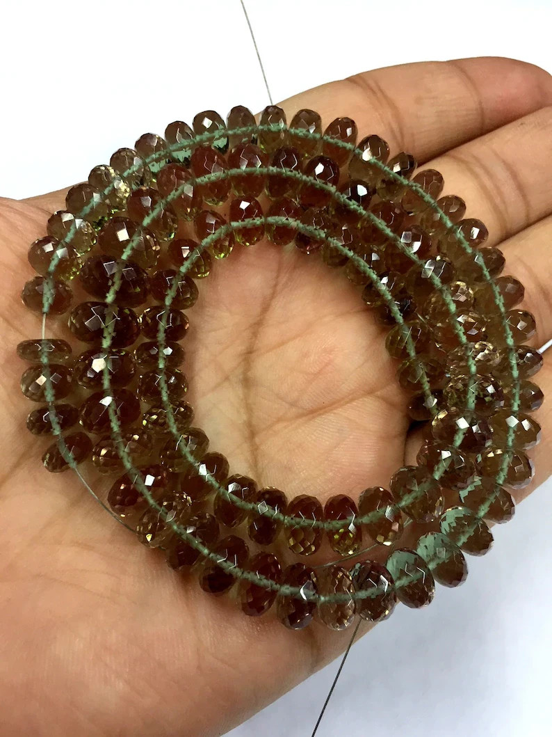 Extremely Beautiful Rare Color Changing Rondelle Beads Faceted Gemstone Beads. Extremely Beautiful Rare Color Changing Rondelle Beads Faceted Gemstone Beads.