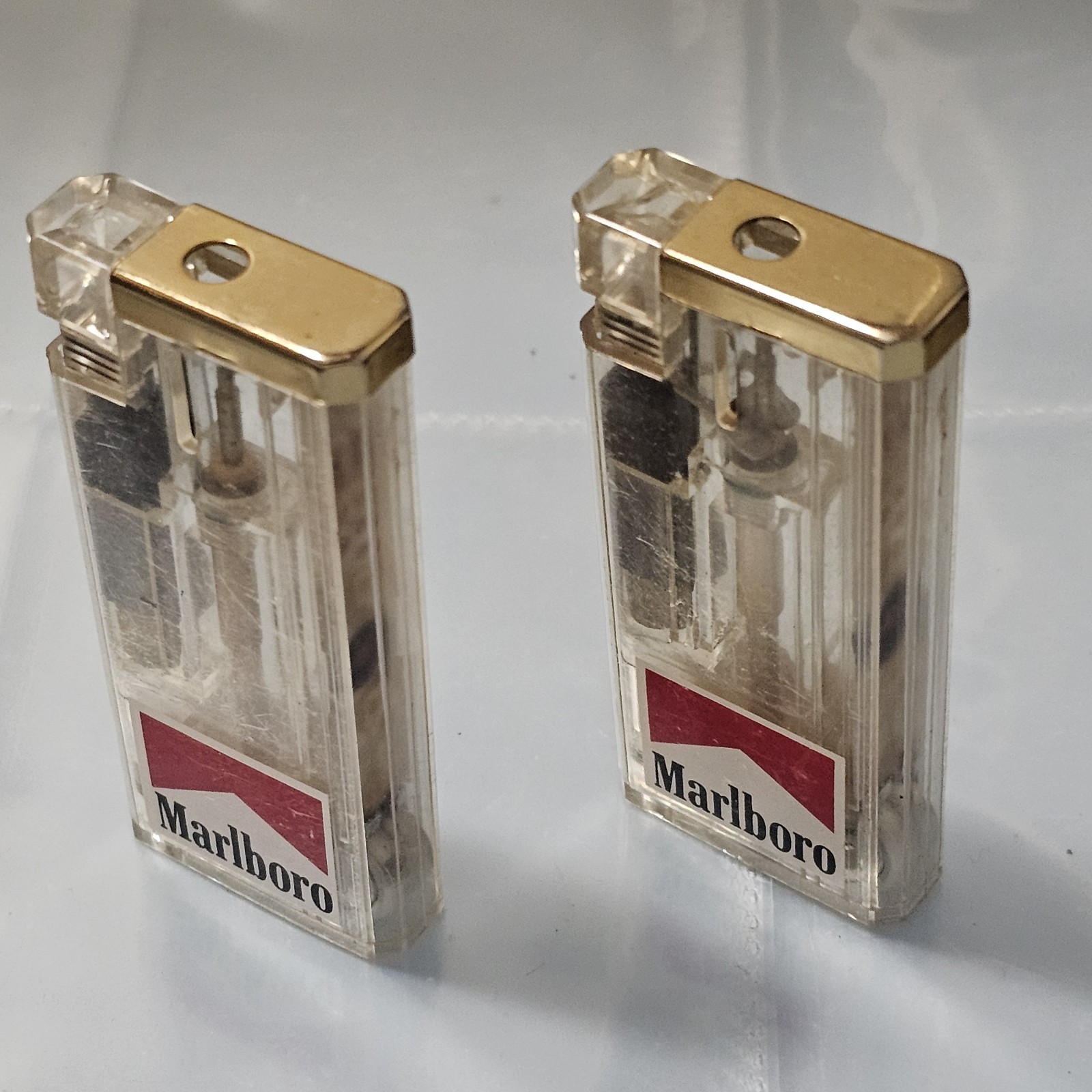 CLEAR MARLBORO CIGARETTE LIGHT UP LIGHTERS X2 Rare 