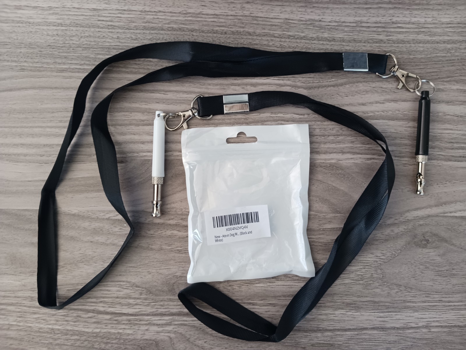 2 Dog Whistles Black and White New In Packaging and Lanyards