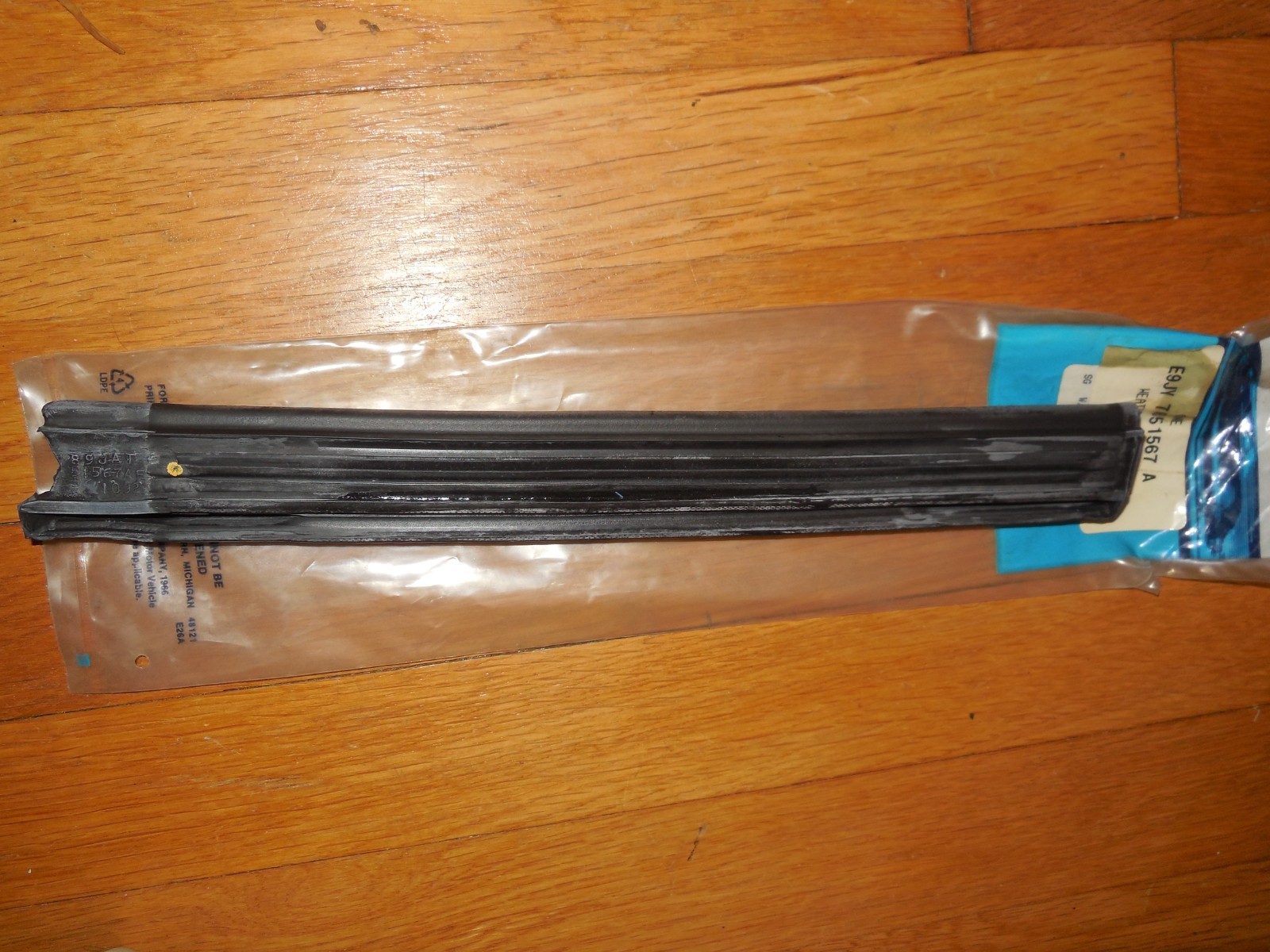 NOS 1991-1994 Mercury Capri Convertible Top Center Weatherstrip LH E9JY-7651567