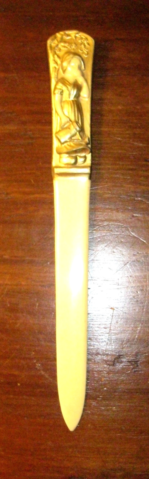 Antique Celluloid Letter Opener Girl Watering Flowers in Relief Gilded 7 5/8 Antique Celluloid Letter Opener Girl Watering Flowers in Relief Gilded 7 5/8