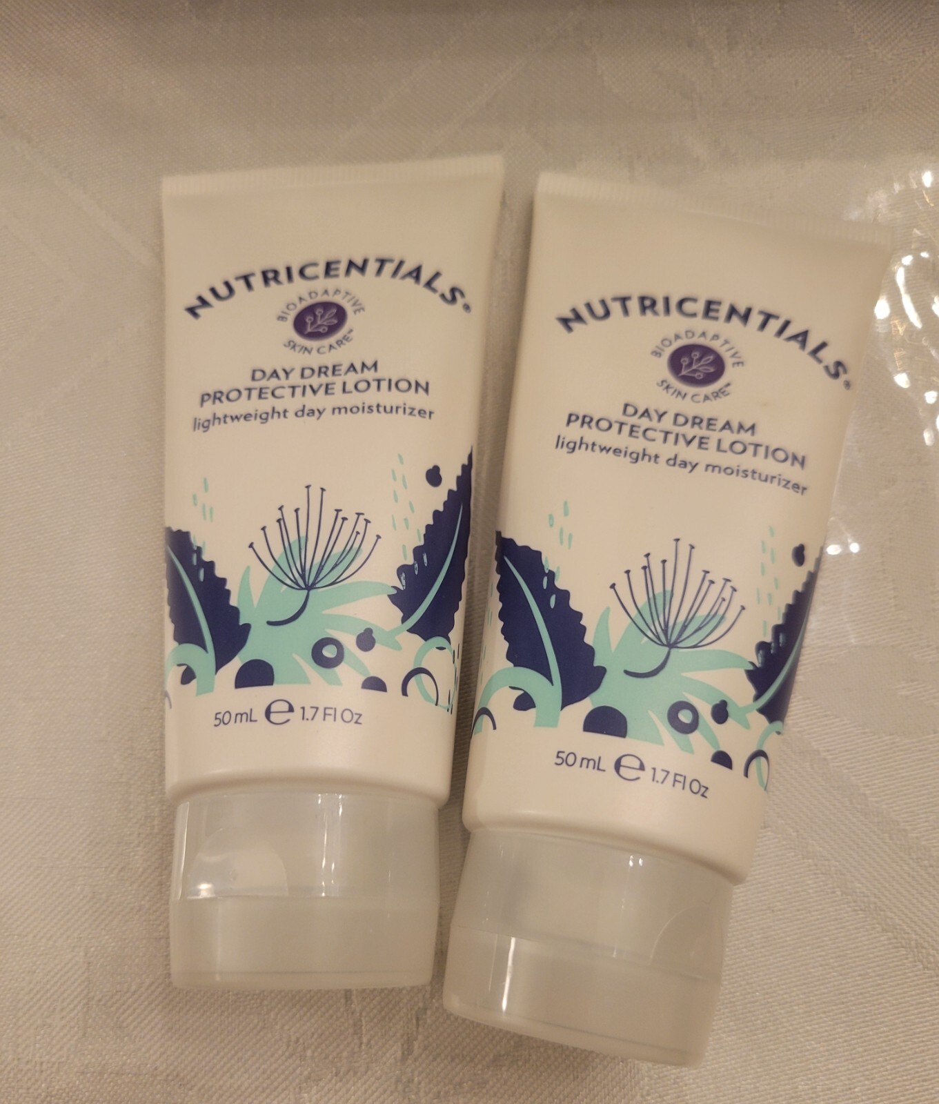 LOT/2 PCS NUTRICENTIALS Day Dream Protective Lotion 1.7 Oz/50ml Day Moisturizer