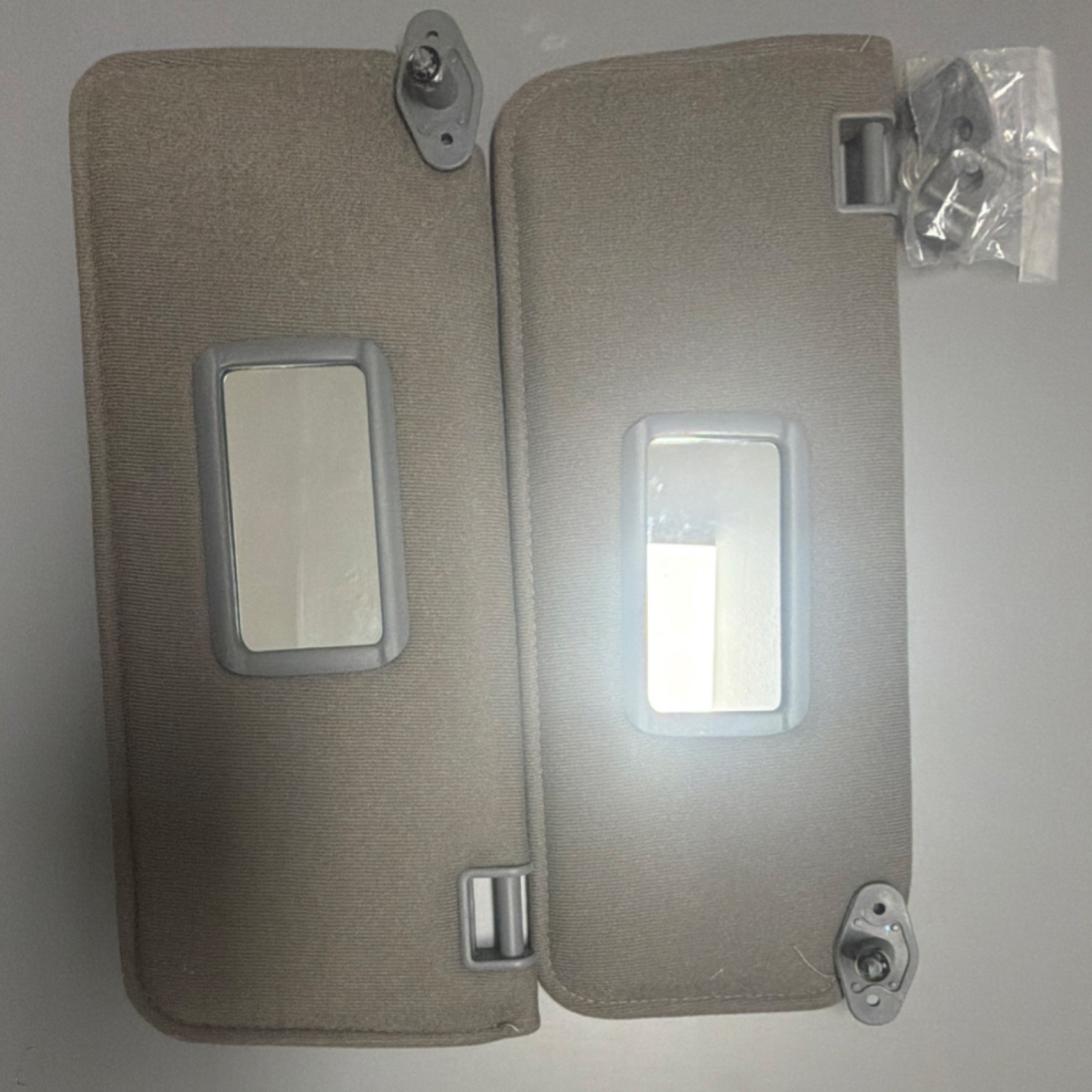 1987 - 1994 Nissan D21. Hardbody Pick Up Pair of Sun Visors Left Right grey