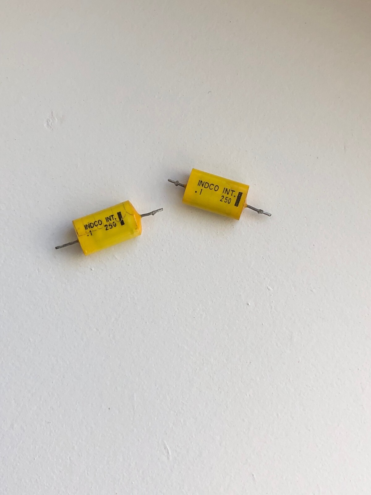 2 INDCO capacitor 0.1uF 10% 250V film metallized polyester axial, .1, 100 nF USA 2 INDCO capacitor 0.1uF 10% 250V film metallized polyester axial, .1, 100 nF USA