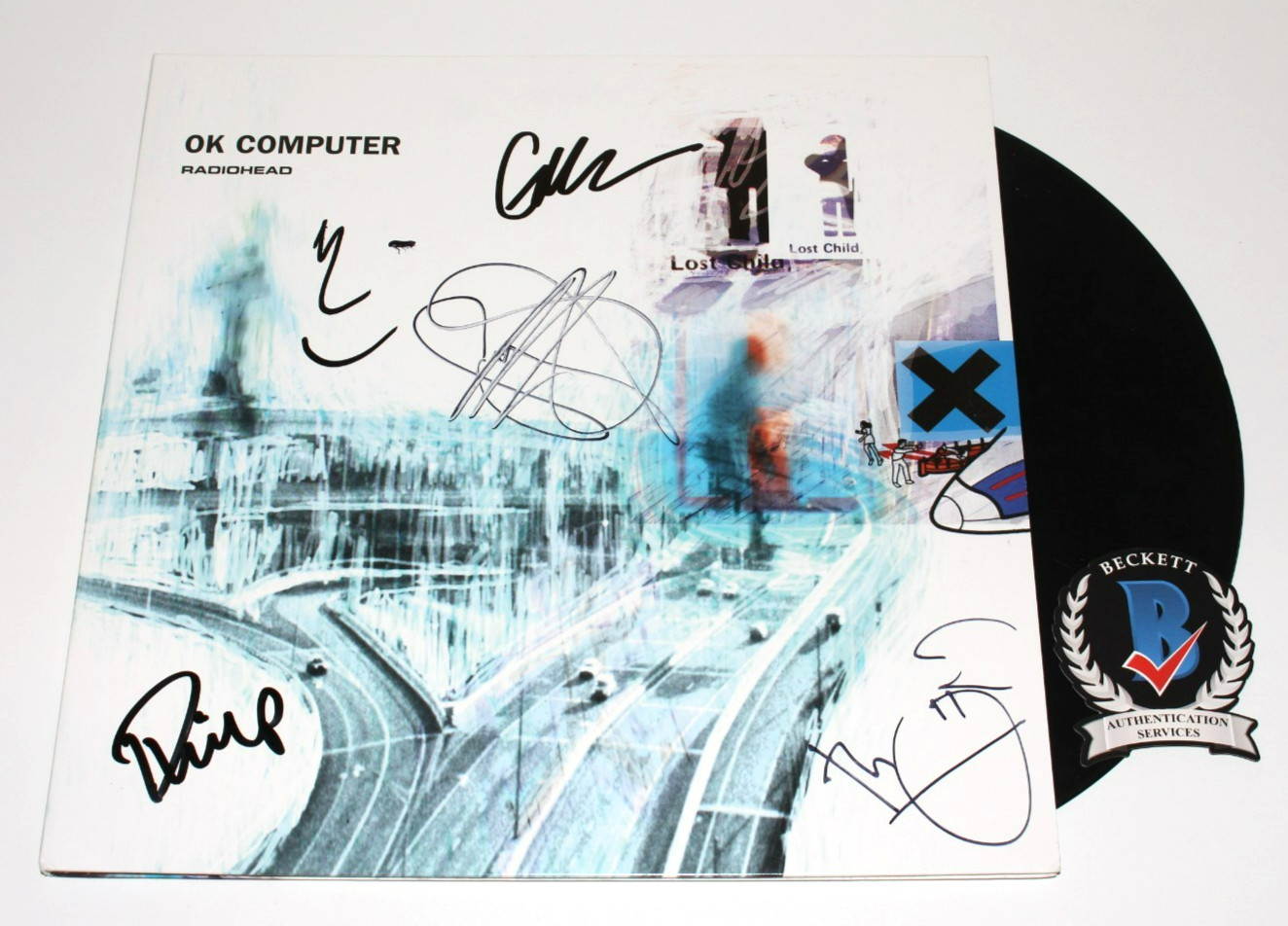 RADIOHEAD BAND SIGNED \'OK COMPUTER\' ALBUM VINYL RECORD BECKETT COA THOM YORKE x5 RADIOHEAD BAND SIGNED \'OK COMPUTER\' ALBUM VINYL RECORD BECKETT COA THOM YORKE x5