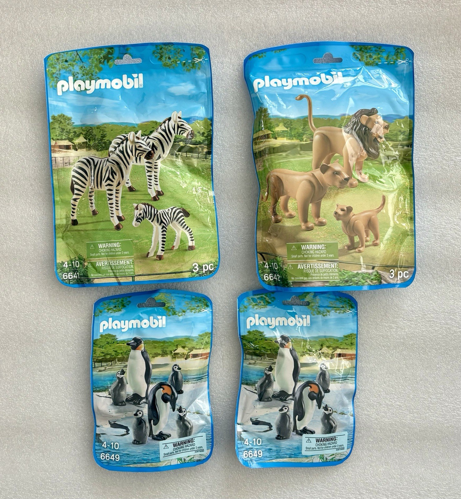 Playmobil 4 sets Zoo 6641 Zebra, Lion 6642 & 2 sets of 6649 Penguin animal lot