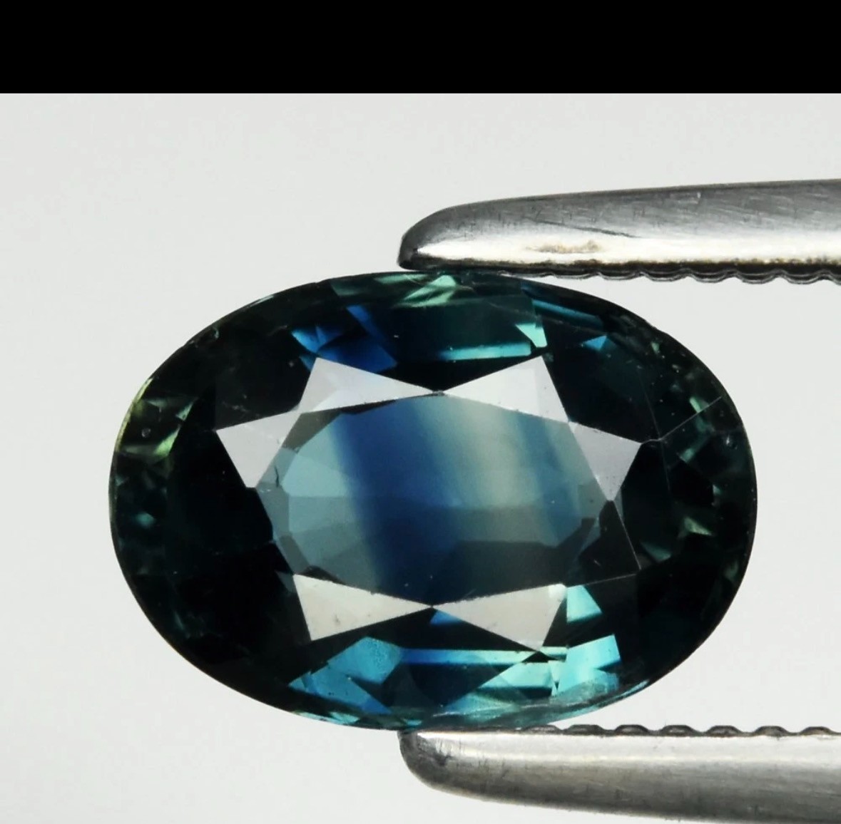 1.05ct 7x5mm VS Oval Natural Blue Green Sapphire - Heated, Australia Gemstone 1.05ct 7x5mm VS Oval Natural Blue Green Sapphire - Heated, Australia Gemstone