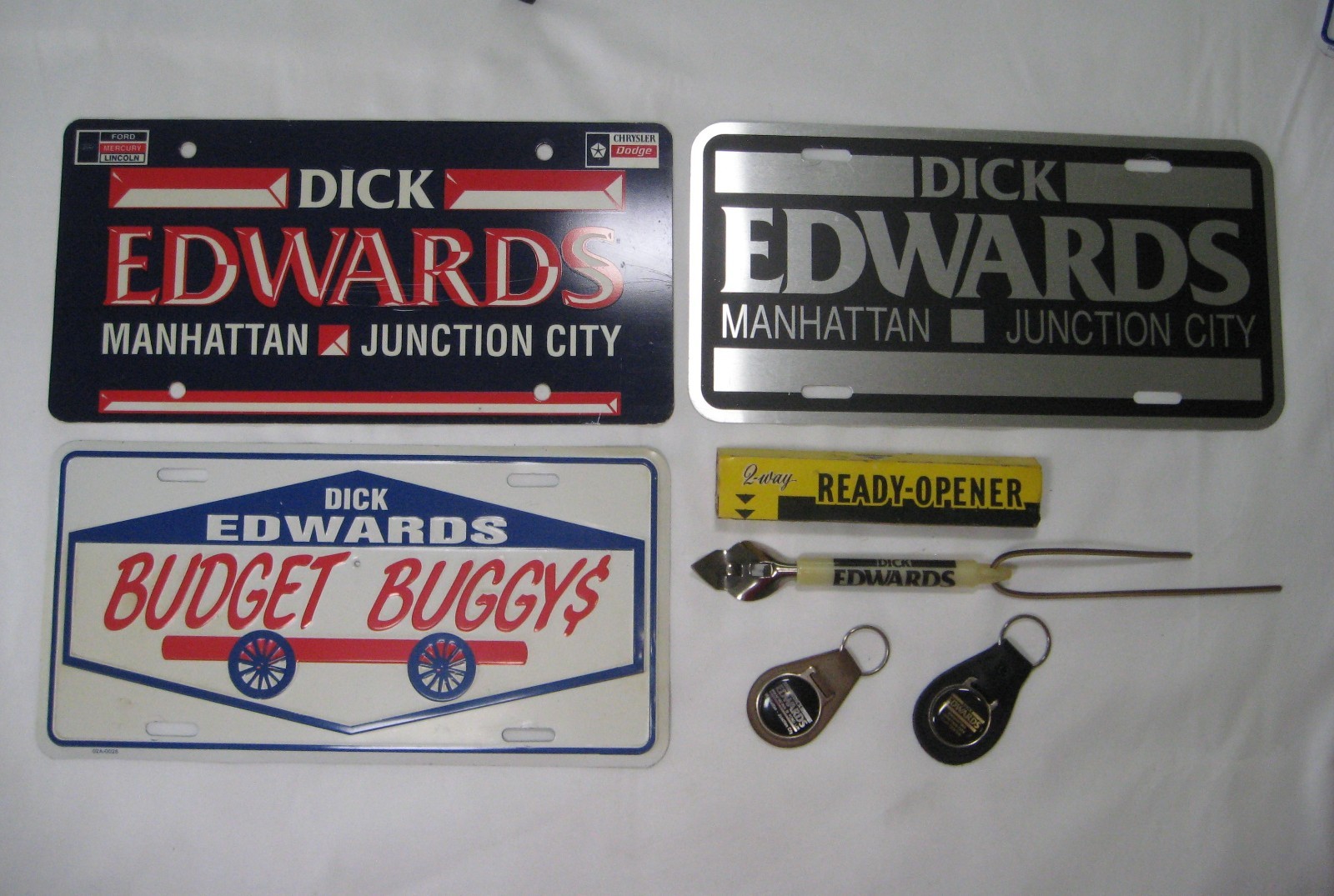 Dick Edwards Ford Chrysler Manhattan KS booster license plate tags (3) + MORE