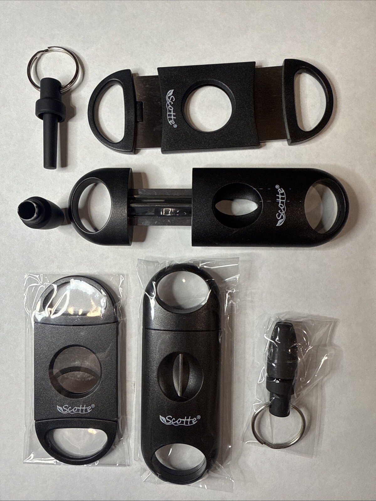 6 Cigar Cutters - Brand New Guillotine, V-Cut, Punch Cut Stainless Steel Scotte 6 Cigar Cutters - Brand New Guillotine, V-Cut, Punch Cut Stainless Steel Scotte