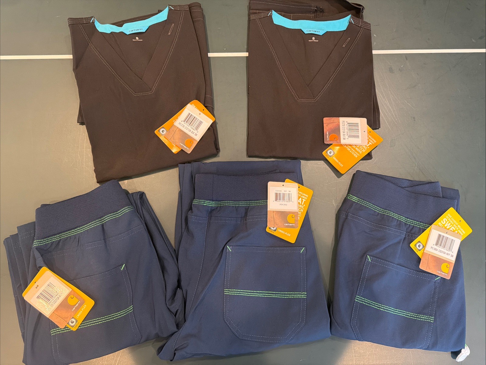Assortment of Women’s Carhartt Tops & Pants - 2 Black Tops, 3 Navy Pants - Small Assortment of Women’s Carhartt Tops & Pants - 2 Black Tops, 3 Navy Pants - Small