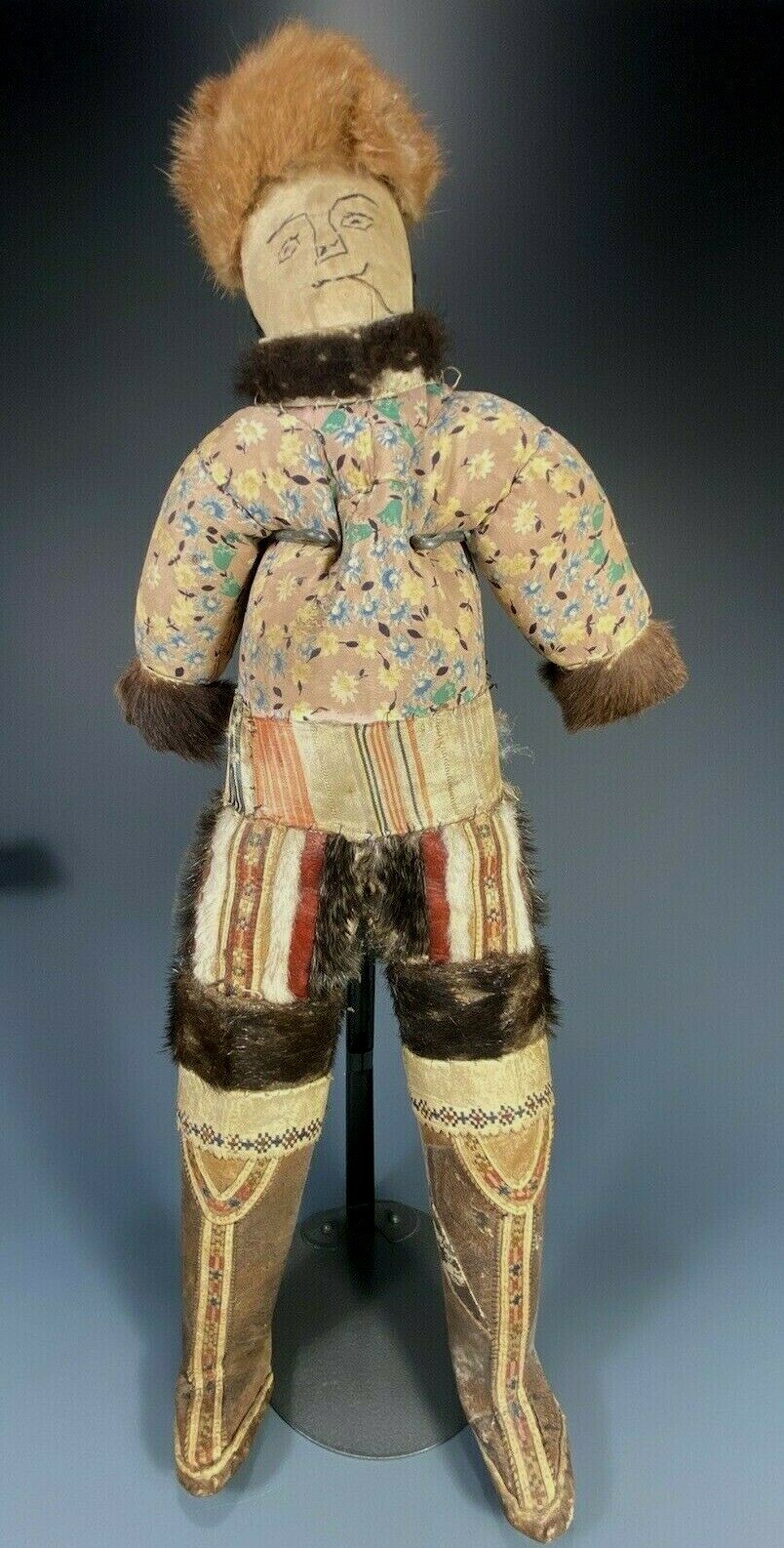Greenland Inuit Natural Fibers & Hide Standing Doll on custom stand 19-20th c. Greenland Inuit Natural Fibers & Hide Standing Doll on custom stand 19-20th c.
