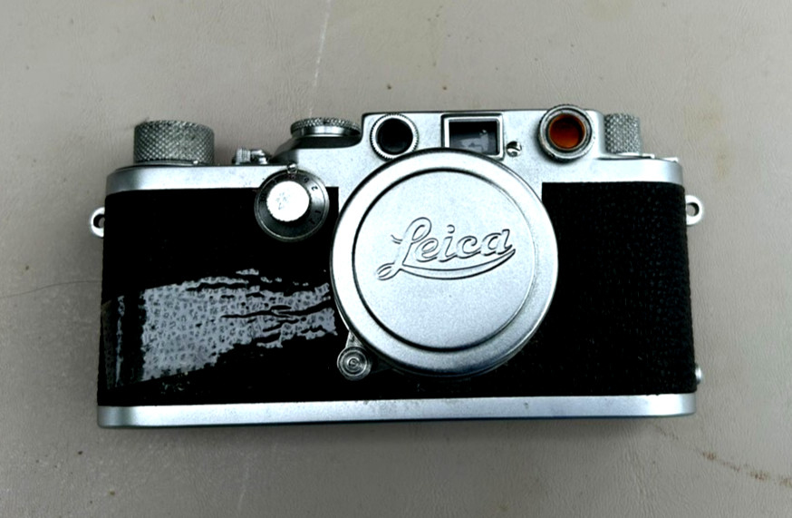 Leica Camera DRP Ernst Leitz Wetzlar- Germany  nr. 671470