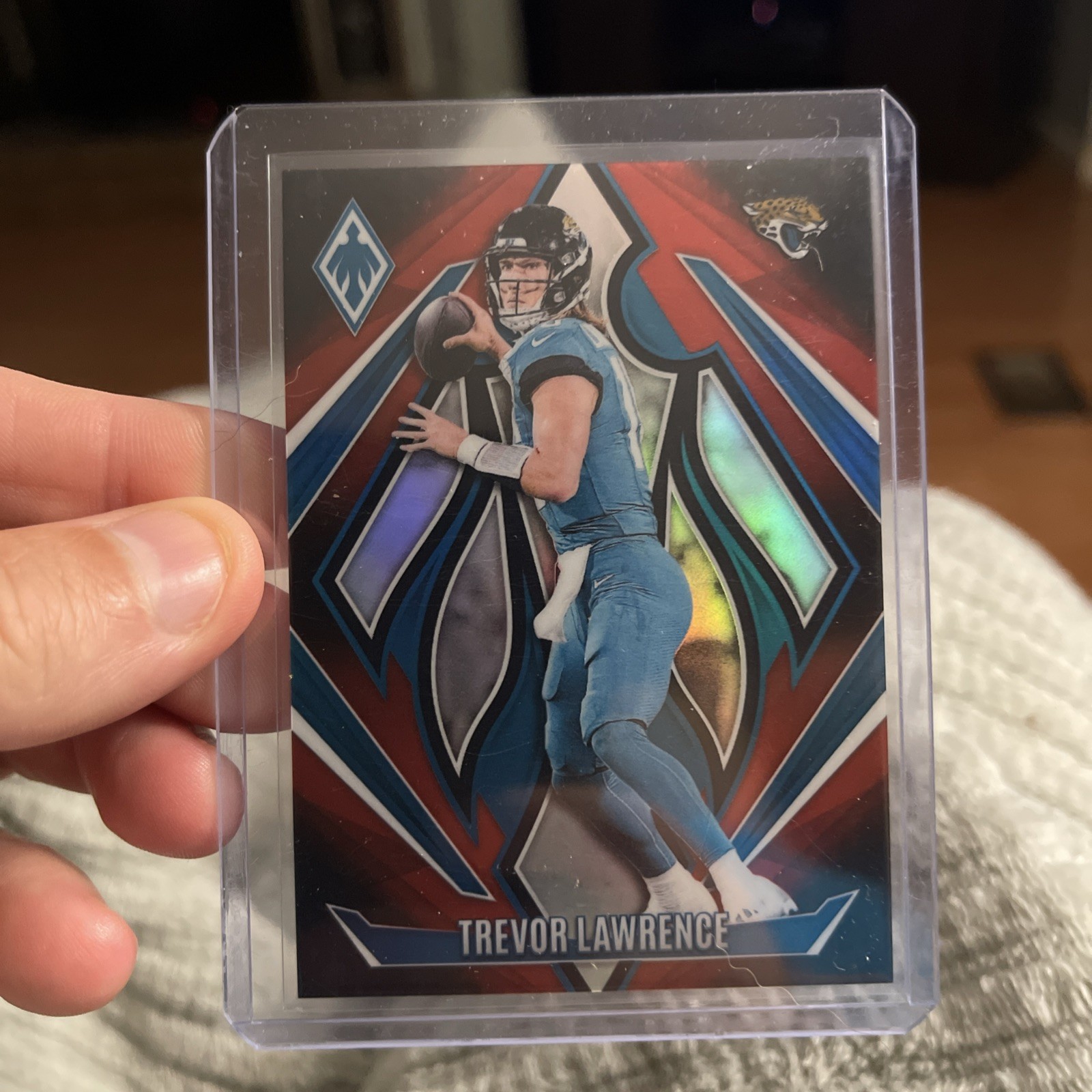 2024 Panini Phoenix Trevor Lawrence Red Fade Parallel /299 Jaguars