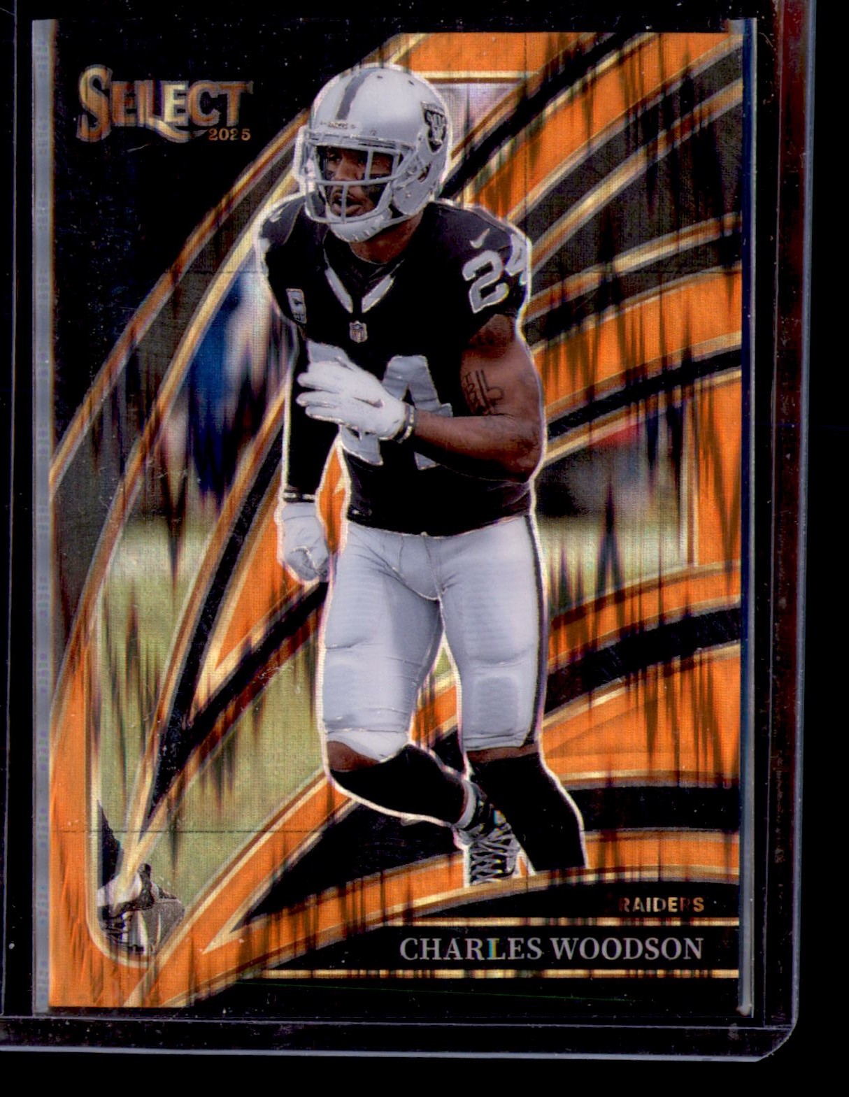 2025 Panini Select #250 Charles Woodson Orange Prizm Shock #/399