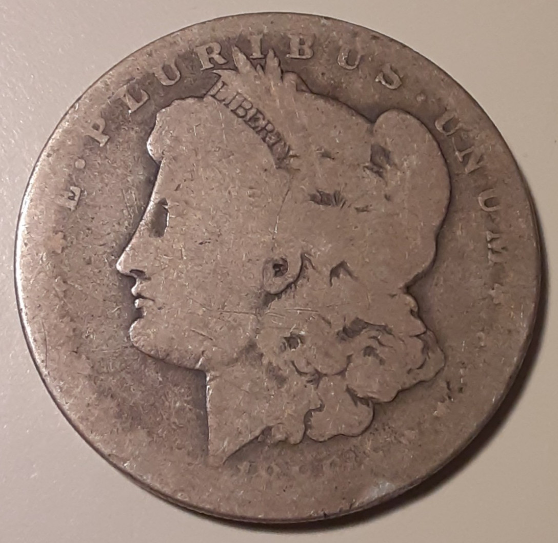 1886-O Morgan Silver Dollar New Orleans Mint US $1 coin 90% (#15-WN21/30) 1886-O Morgan Silver Dollar New Orleans Mint US $1 coin 90% (#15-WN21/30)