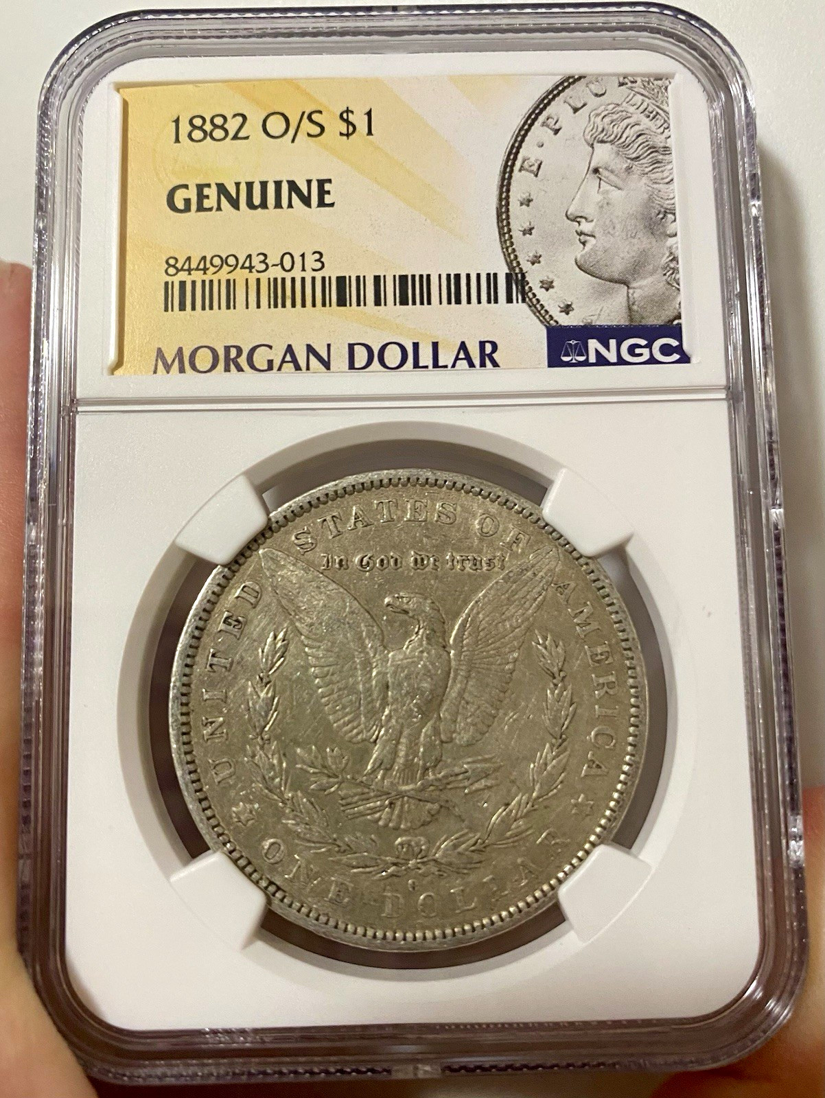 1882 O/S Morgan Silver Dollar NGC Genuine Cert 8449943-013