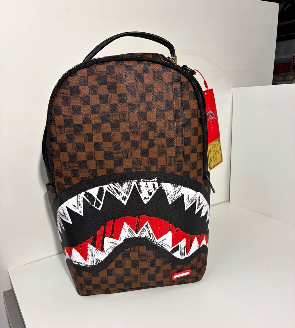 Sprayground Limited Edition Brown Checkered Shark Mouth Large Backpack Sprayground Limited Edition Brown Checkered Shark Mouth Large Backpack