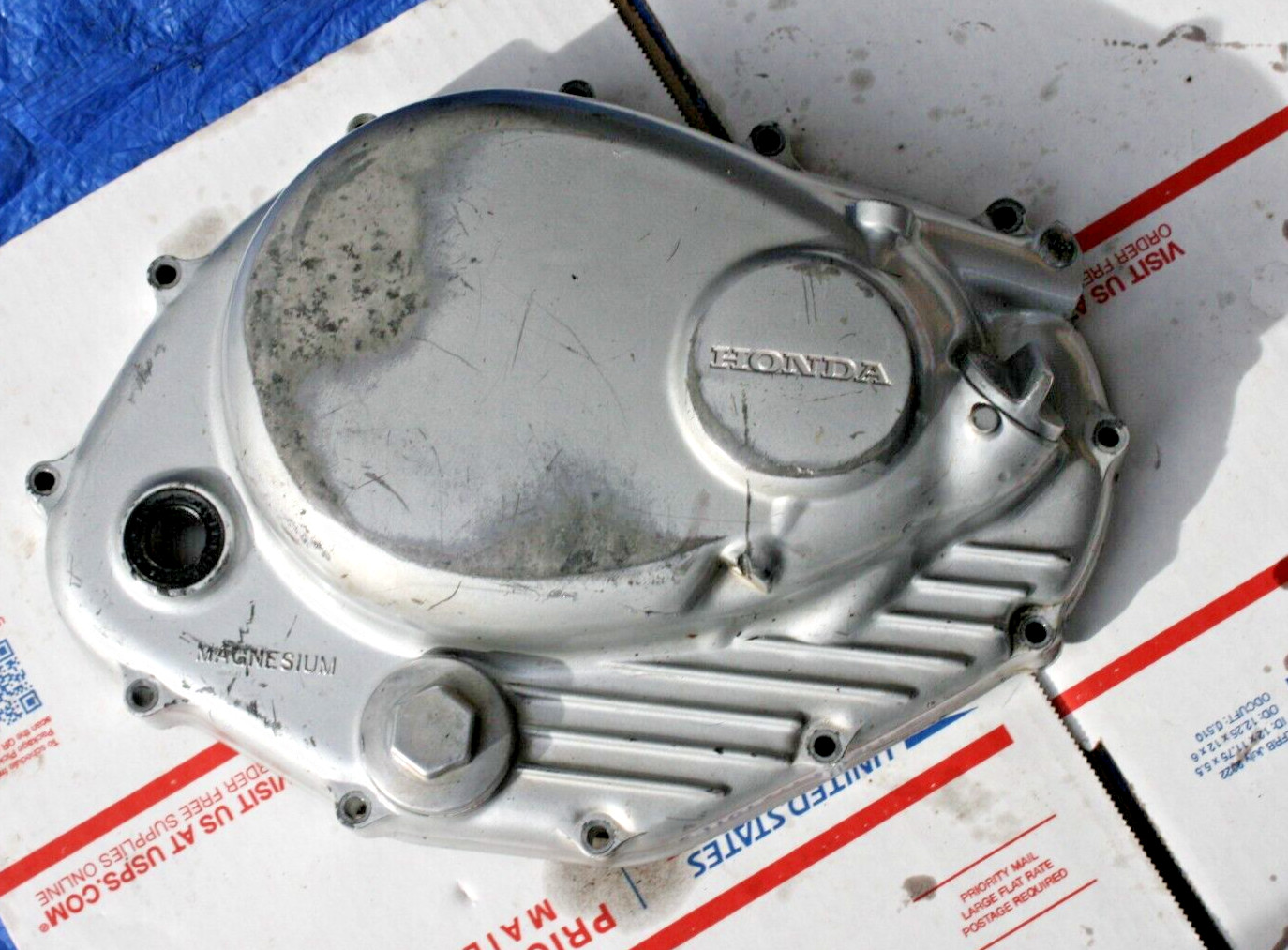 1975-76 HONDA XL250 OEM CLUTCH COVER  VIN #L250E-1006969