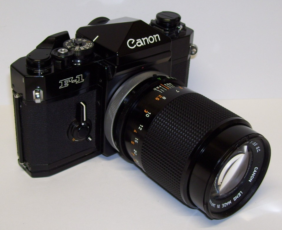 Canon F-1 35mm SLR Film Camera + Canon lens fd 135mm 1:3.5  Tested    EXUC