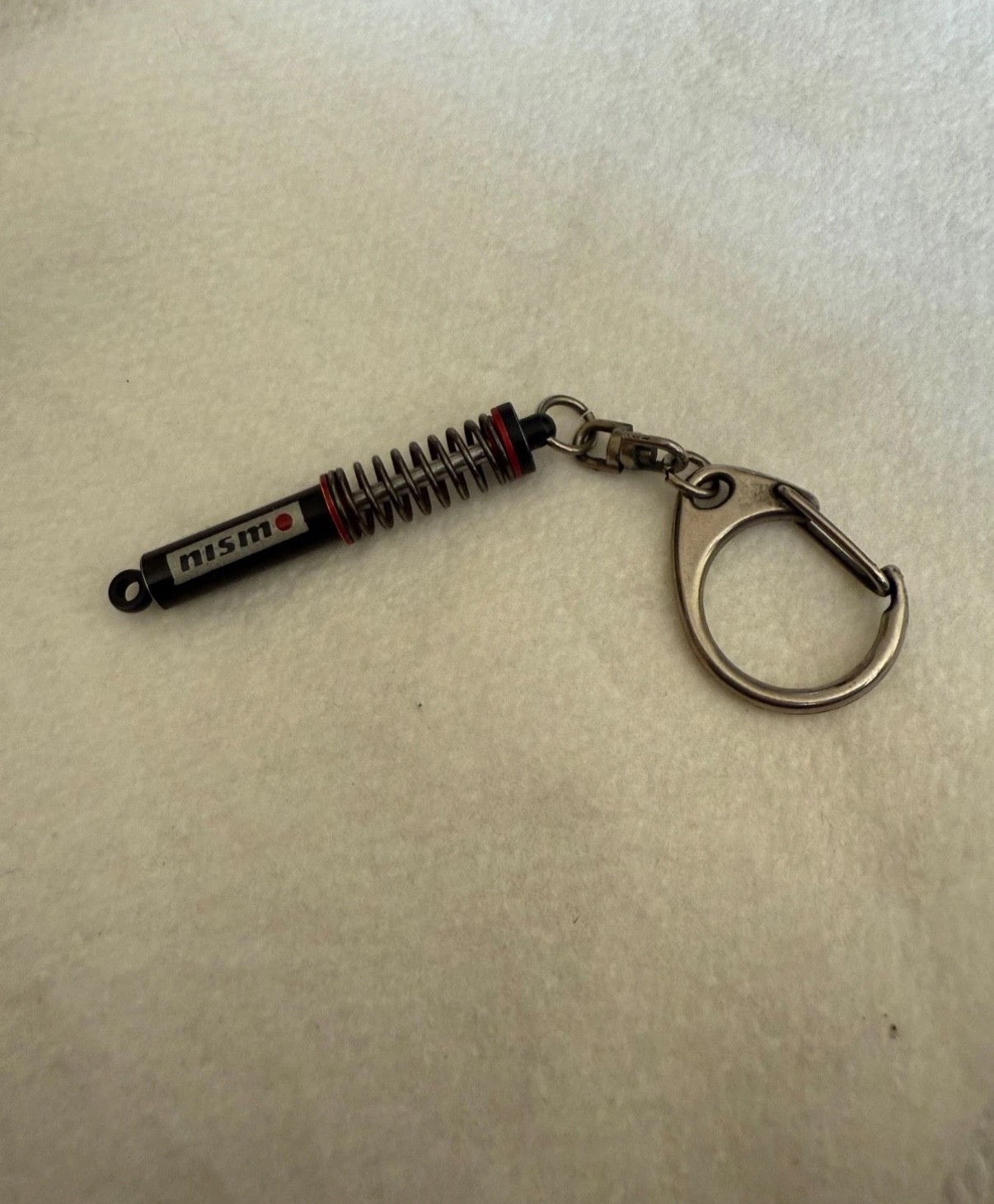 NISMO MID LOGO KEYCHAIN RARE FOR SKYLINE GTR R32 R33 R34 S13 S14 S15 Z32 Z33 Z34 NISMO MID LOGO KEYCHAIN RARE FOR SKYLINE GTR R32 R33 R34 S13 S14 S15 Z32 Z33 Z34