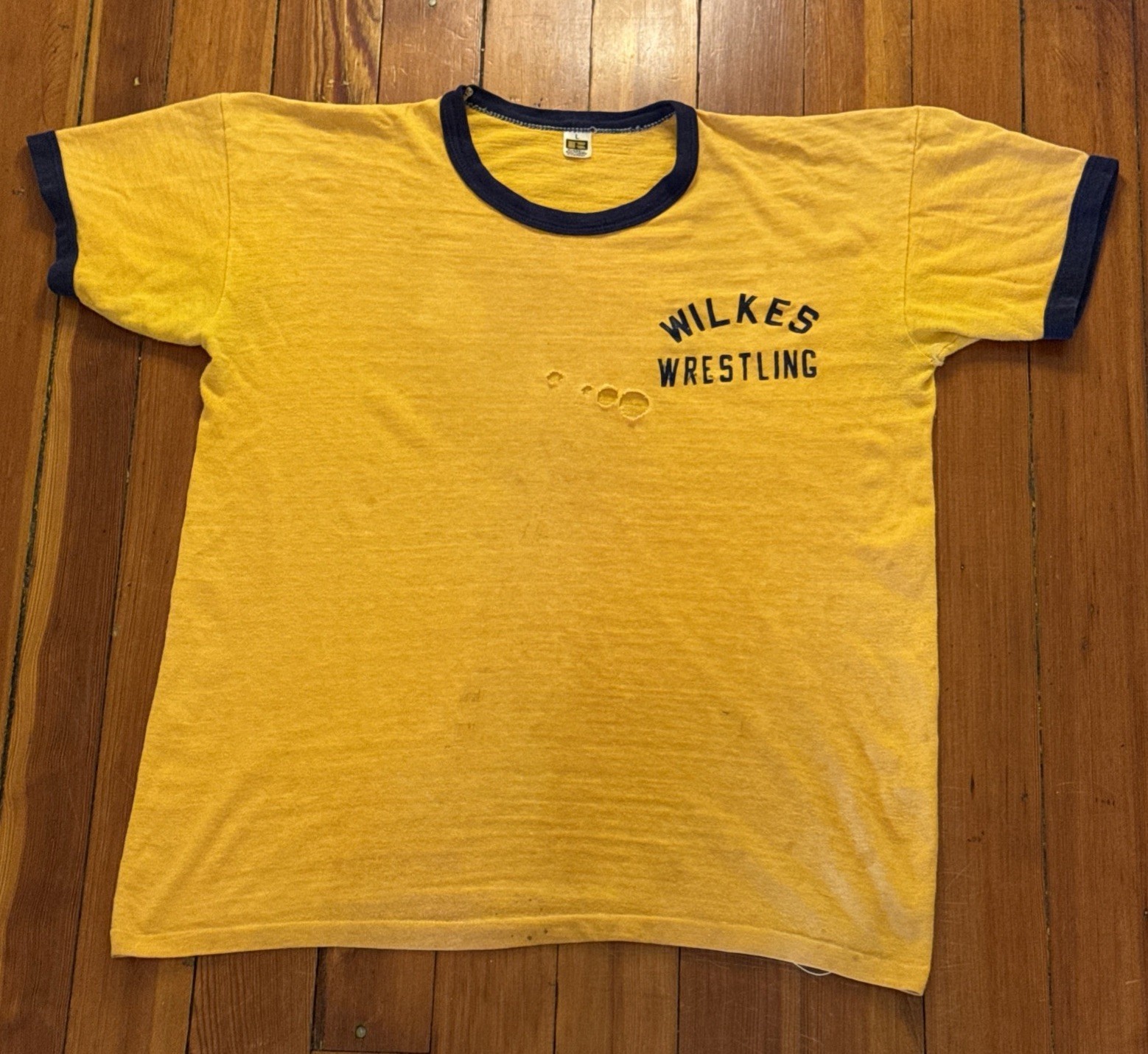 1960s Russell Southern Company Wilkes Wrestling Yellow Ringer T-Shirt Size Large 1960s Russell Southern Company Wilkes Wrestling Yellow Ringer T-Shirt Size Large