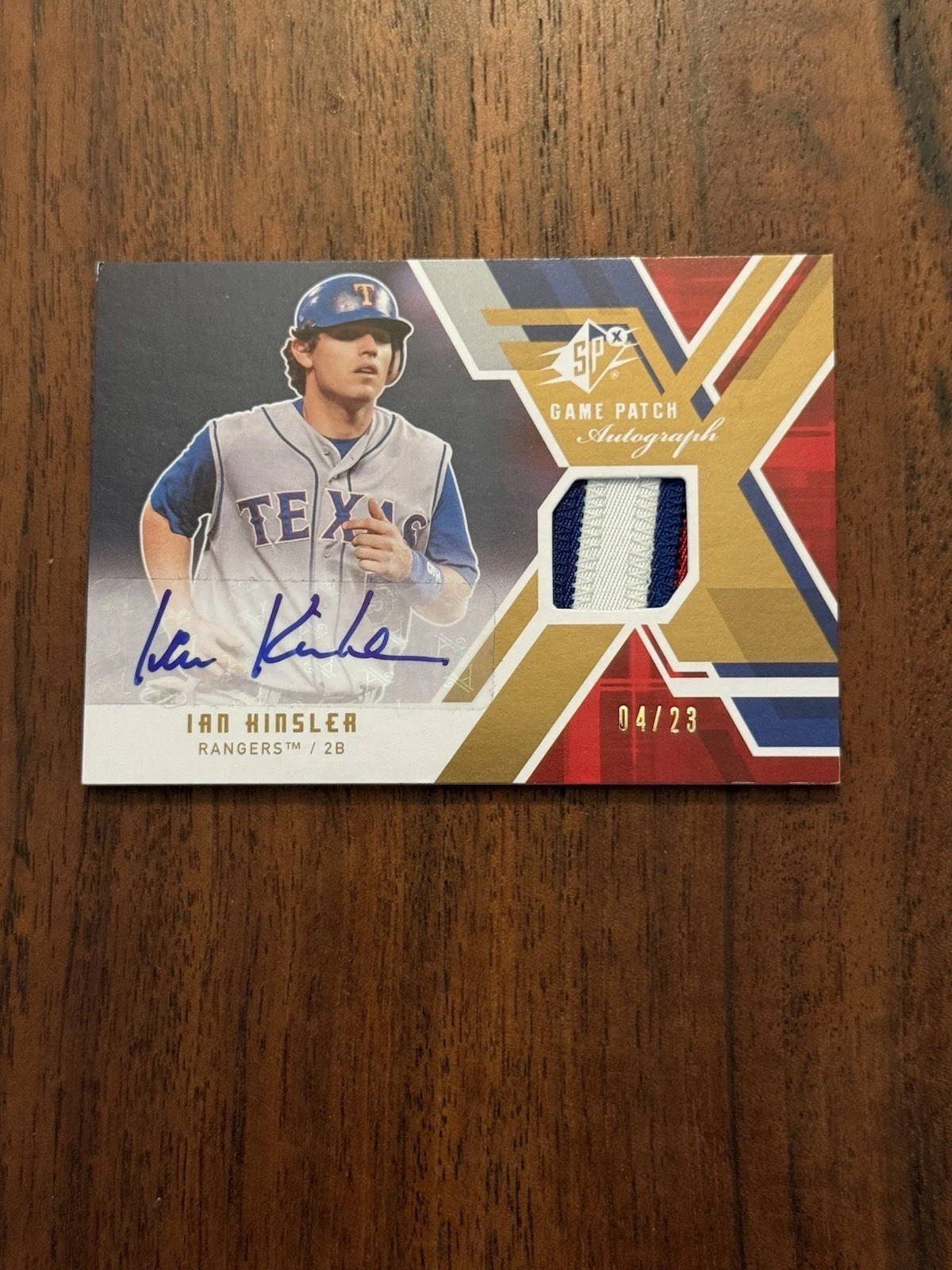 2009 SPx - Game Jersey Autographs Kinsler #GJA-IK Patch Blue Ink /23 (AU, MEM) 2009 SPx - Game Jersey Autographs Kinsler #GJA-IK Patch Blue Ink /23 (AU, MEM)