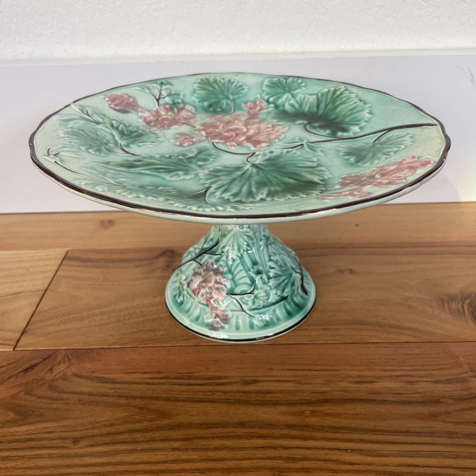 Rare Majolica Cake Plate Pedestal Stand Green Leaves Red Pink Flowers 9.25” Dia Rare Majolica Cake Plate Pedestal Stand Green Leaves Red Pink Flowers 9.25” Dia