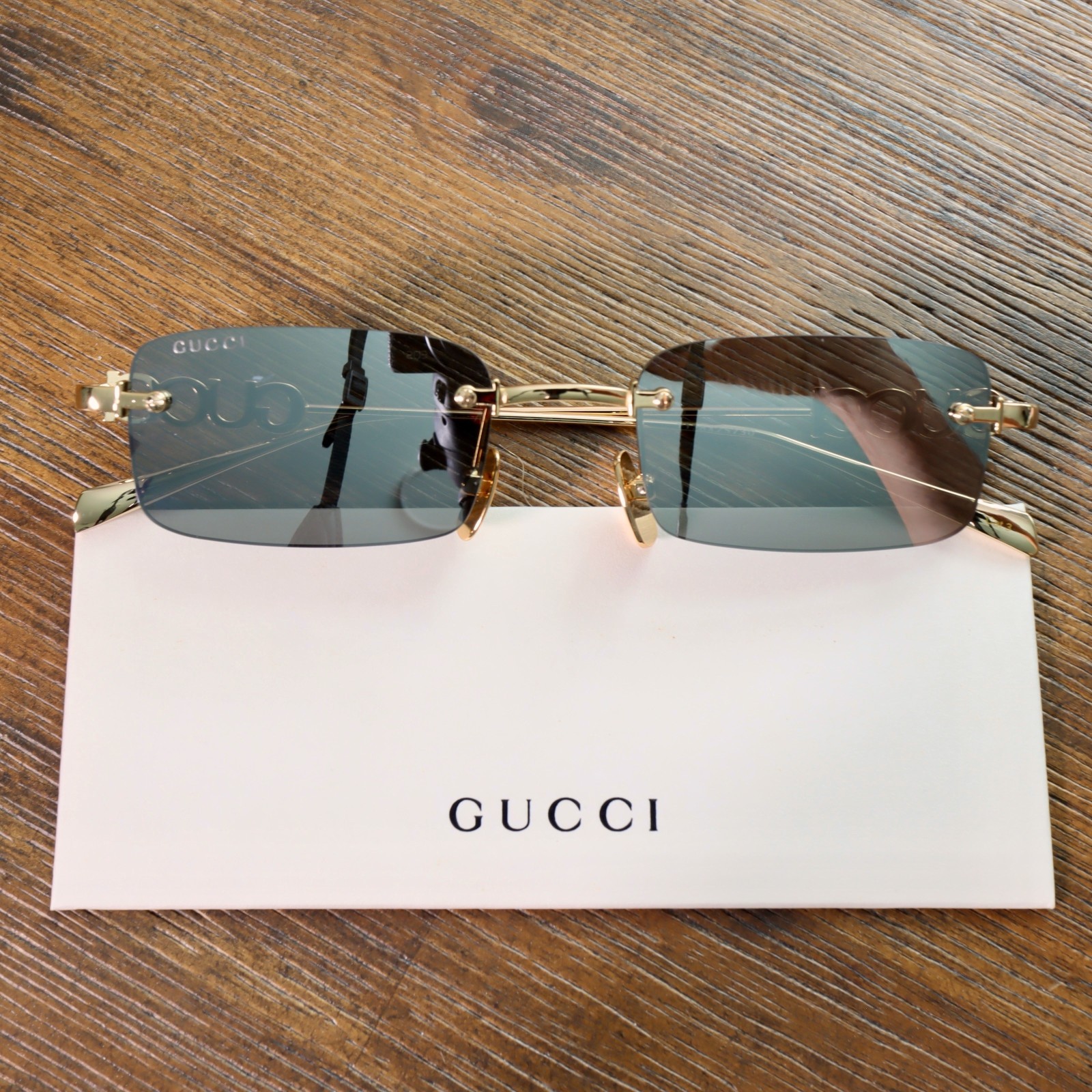 Gucci GG1808S 003 52mm Square Sunglasses in Gold/Gray Lens Gucci GG1808S 003 52mm Square Sunglasses in Gold/Gray Lens