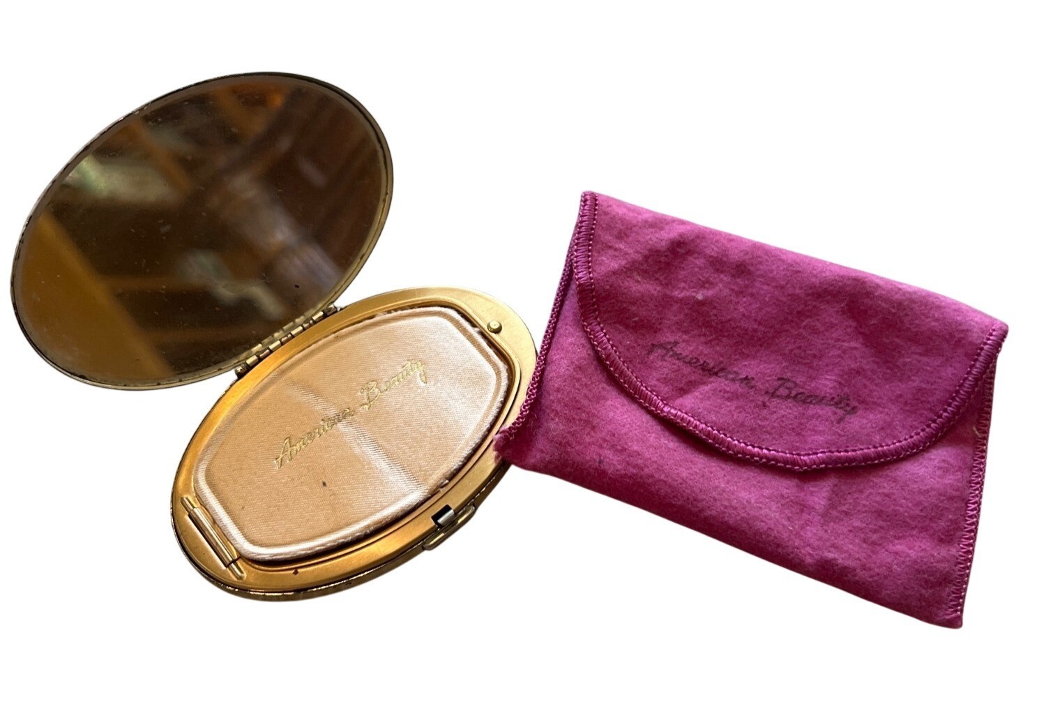 American Beauty oval gold silver powder compact 1940s vintage