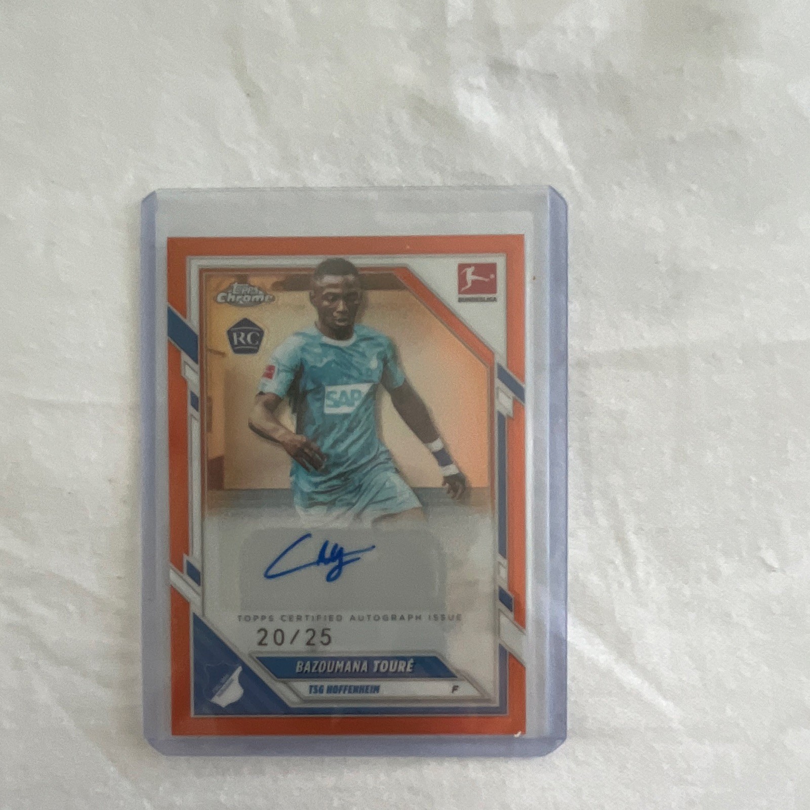 2025-26 Topps Chrome Bundesliga - Autographs Bazoumana Toure True Orange /25 RC