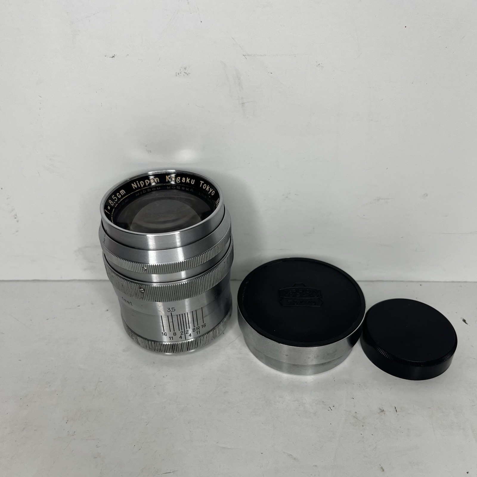 Nikon Nikkor-P.C 8.5cm f/2 Lens & Shade Cover Nippon Kogaku Japan Range Finder Nikon Nikkor-P.C 8.5cm f/2 Lens & Shade Cover Nippon Kogaku Japan Range Finder