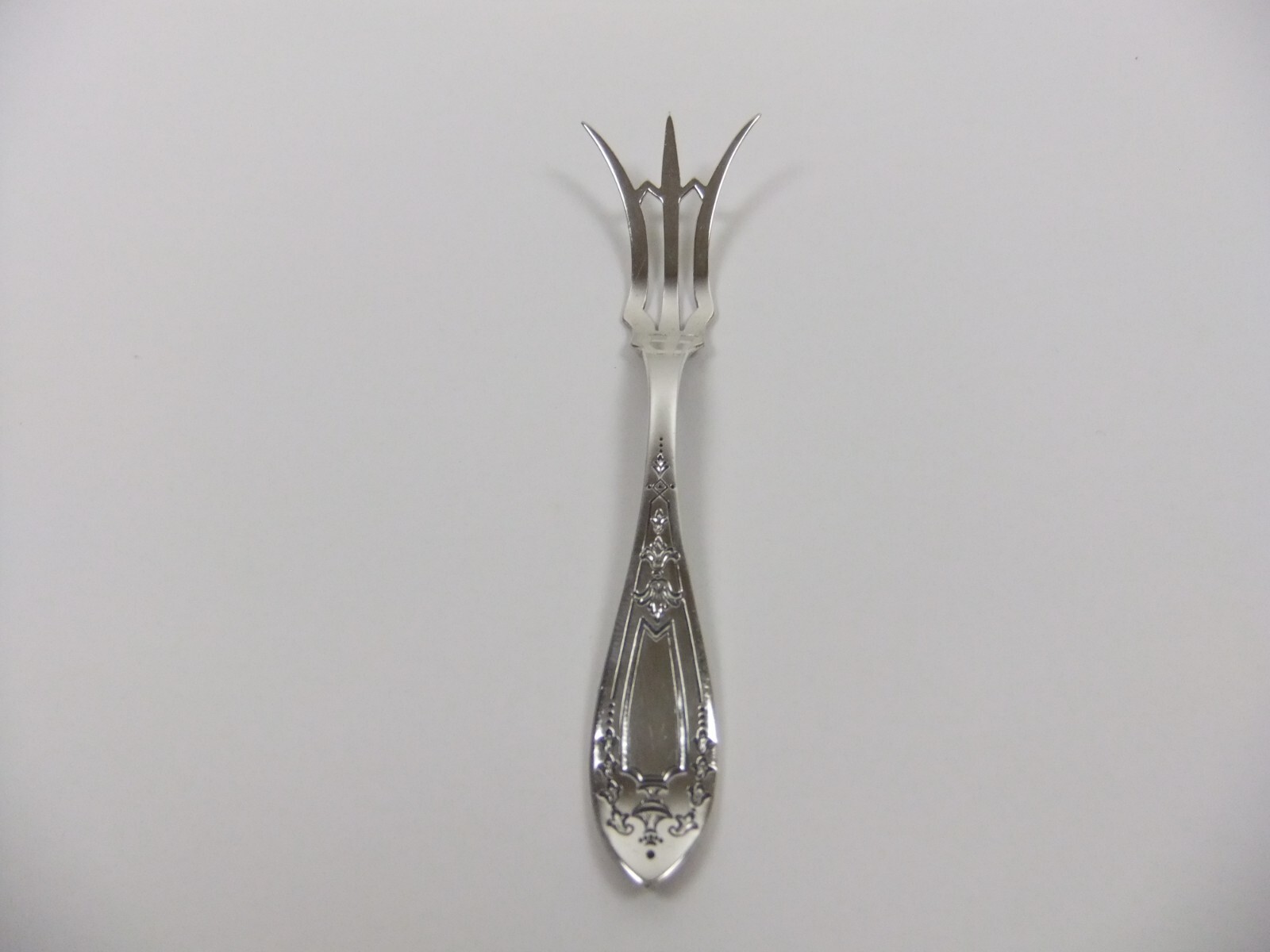 Ornate Sterling Silver Lemon Fork Weidlich Silver