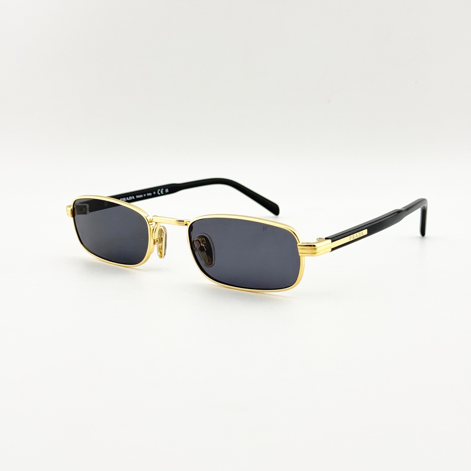 Prada PRB54S Rectangle Sunglasses Gold Frame Gray Lens Black Temples 54mm