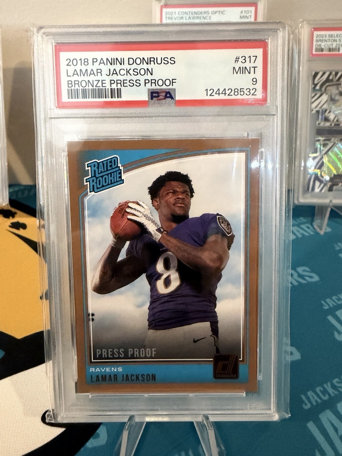 2018 Panini Donruss - Rated Rookie Lamar Jackson #317 Press Proof Bronze (RC) 2018 Panini Donruss - Rated Rookie Lamar Jackson #317 Press Proof Bronze (RC)