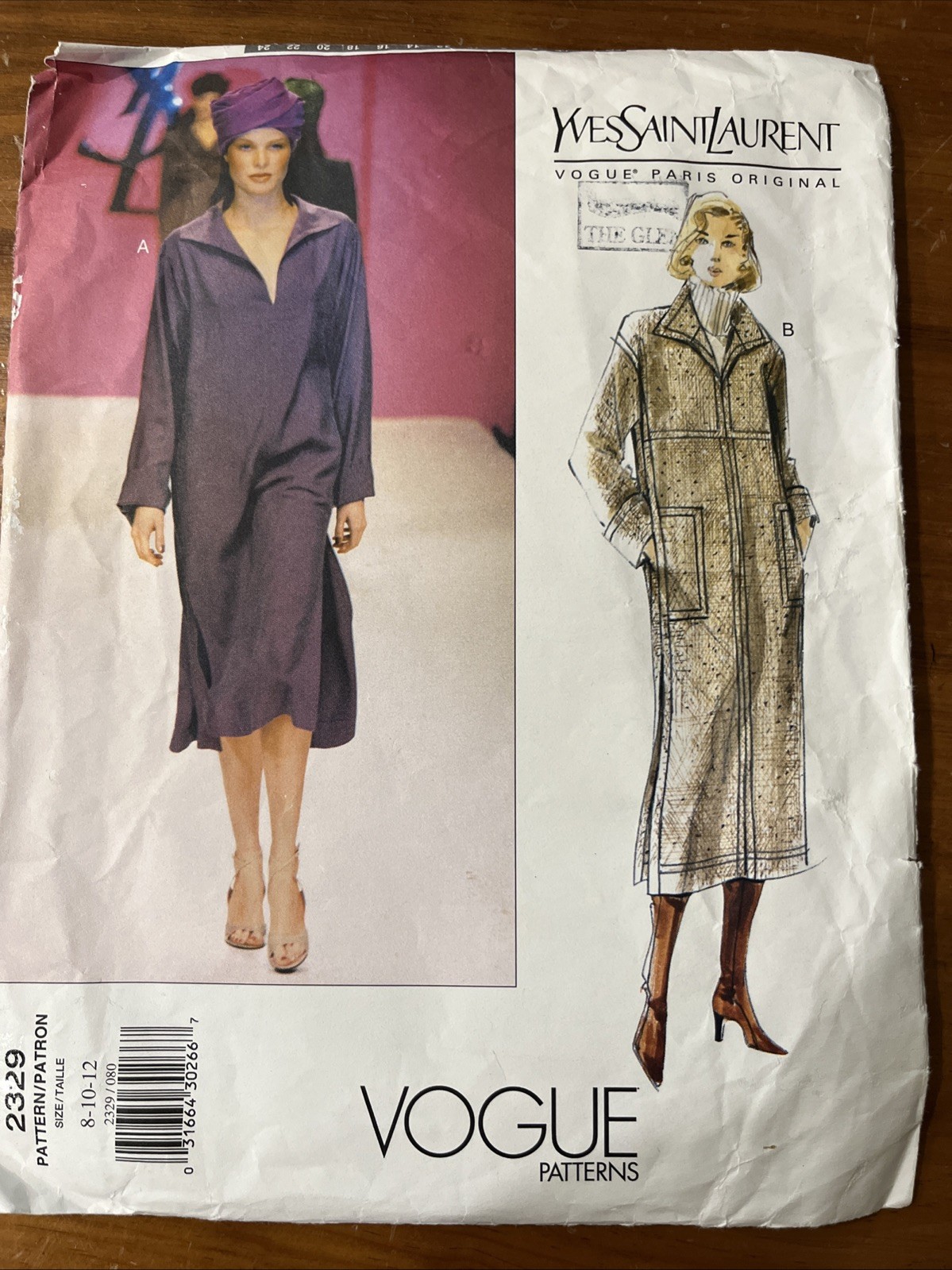 Vintage Vogue Yves Saint Laurent Dress 2329 Sewing Pattern Size UnCut 1999. Vintage Vogue Yves Saint Laurent Dress 2329 Sewing Pattern Size UnCut 1999.