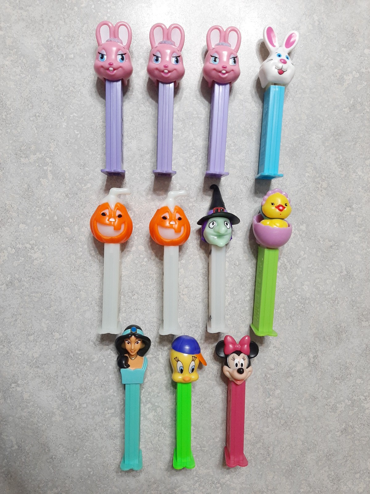 Eleven (11) Vintage Pez Dispensers Easter Halloween Jasmine Minnie Tweety