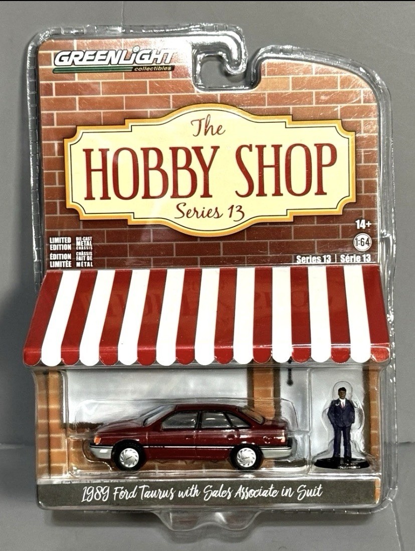 Greenlight 1/64 1989 Ford Taurus GL w/ Salesman Hobby Shop Series 13