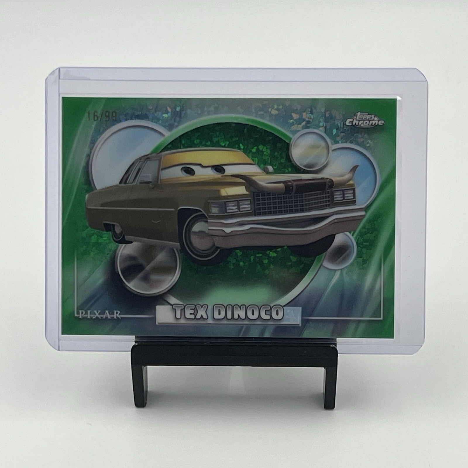 2026 Topps Chrome Disney Pixar Tex Dinoco #19 Green Mini Diamond 16/99 Parallel 2026 Topps Chrome Disney Pixar Tex Dinoco #19 Green Mini Diamond 16/99 Parallel