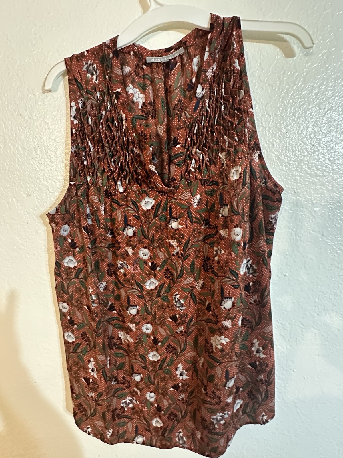 Rust-red floral blouse by the brand Daniel Rainn in a size 2X.
