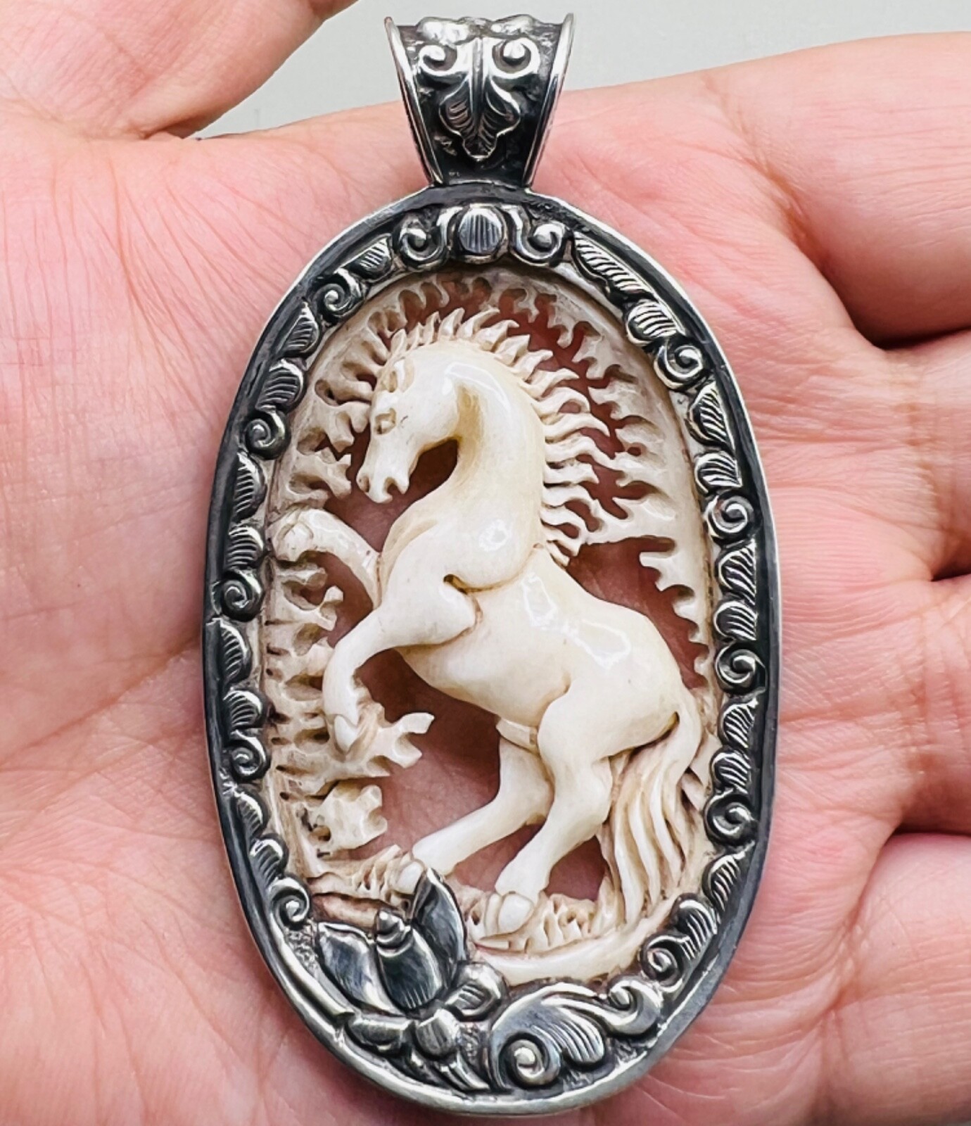 Wonderful solid silver Tibetan carved animal horse figure pendant