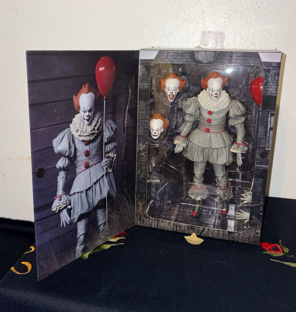 NECA It Pennywise Boxed Action Figure w/ Balloon & Alternate Head open box