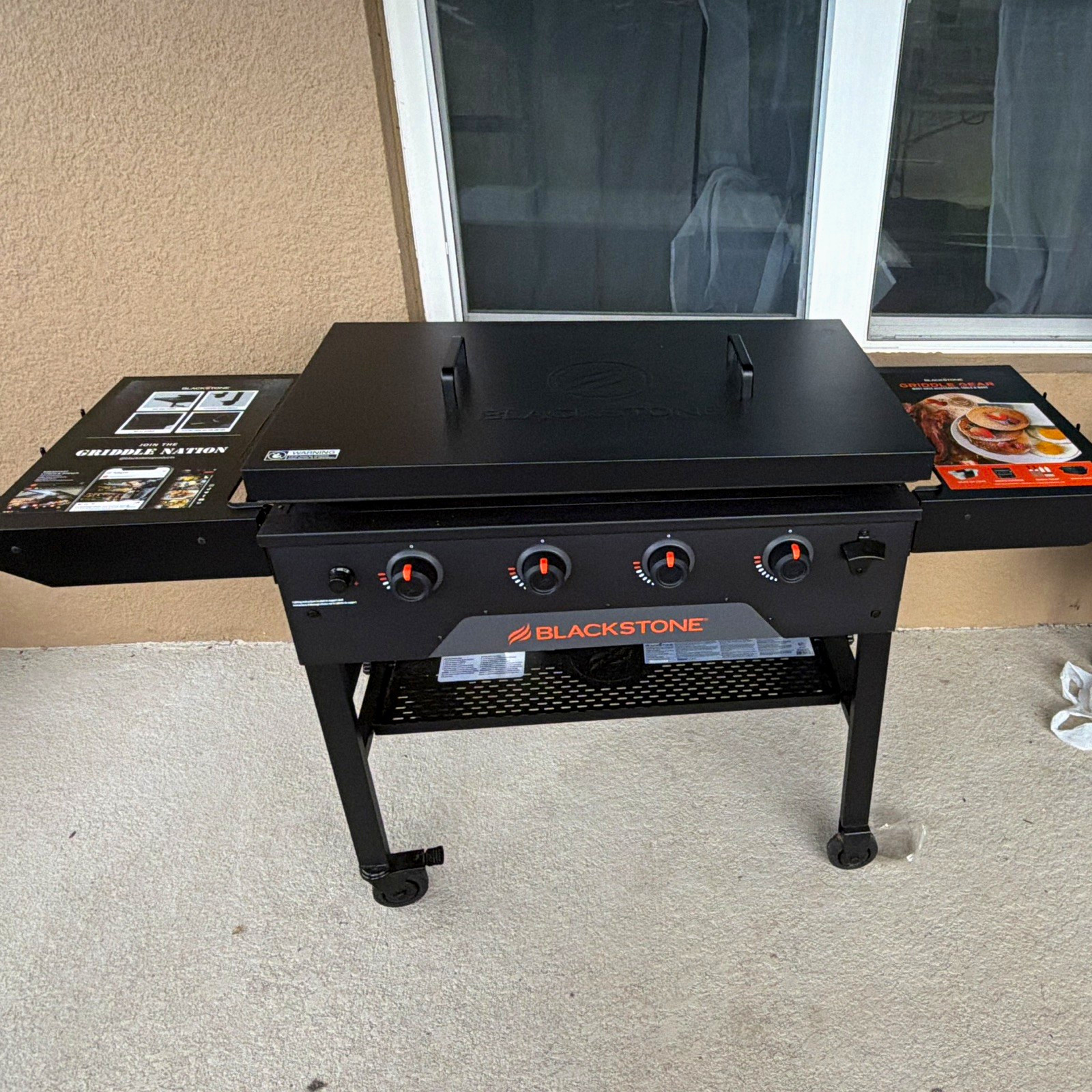 Blackstone 36in 4-Burner Propane Griddle w/ Hood Cart Wheels Black 2177