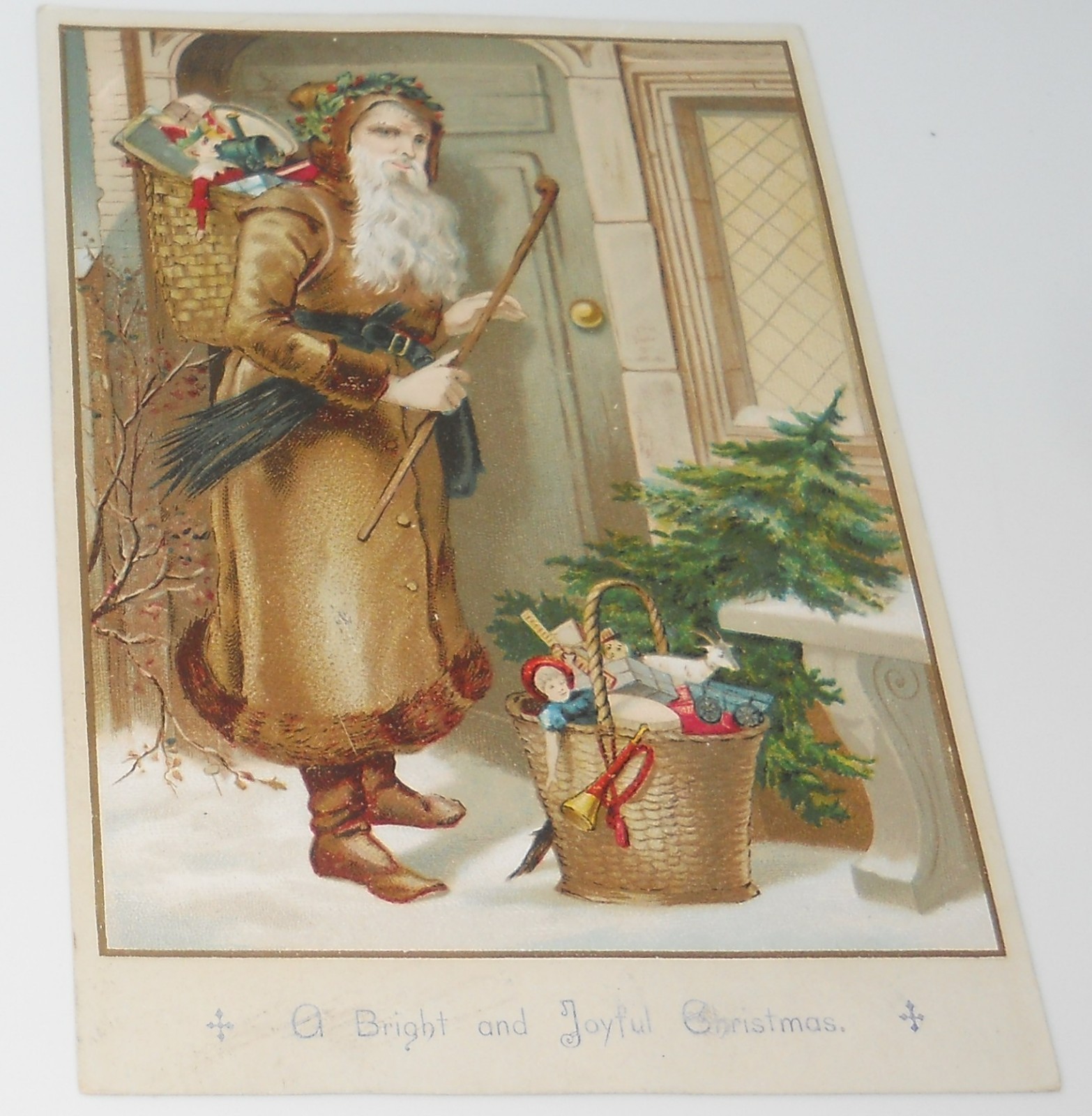 SCARCE ANTIQUE CHRISTMAS TRADE CARD SANTA CANE BASKET TOYS DOORWAY SNOW TREE SCARCE ANTIQUE CHRISTMAS TRADE CARD SANTA CANE BASKET TOYS DOORWAY SNOW TREE