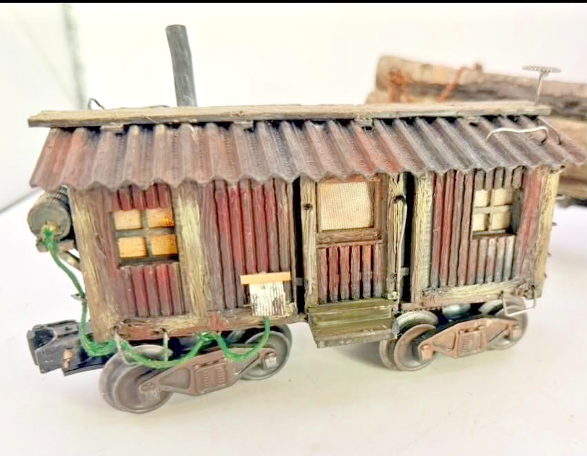O gauge Hand-crafted, 20' Logging Bunk Car, w/ flicker lighting