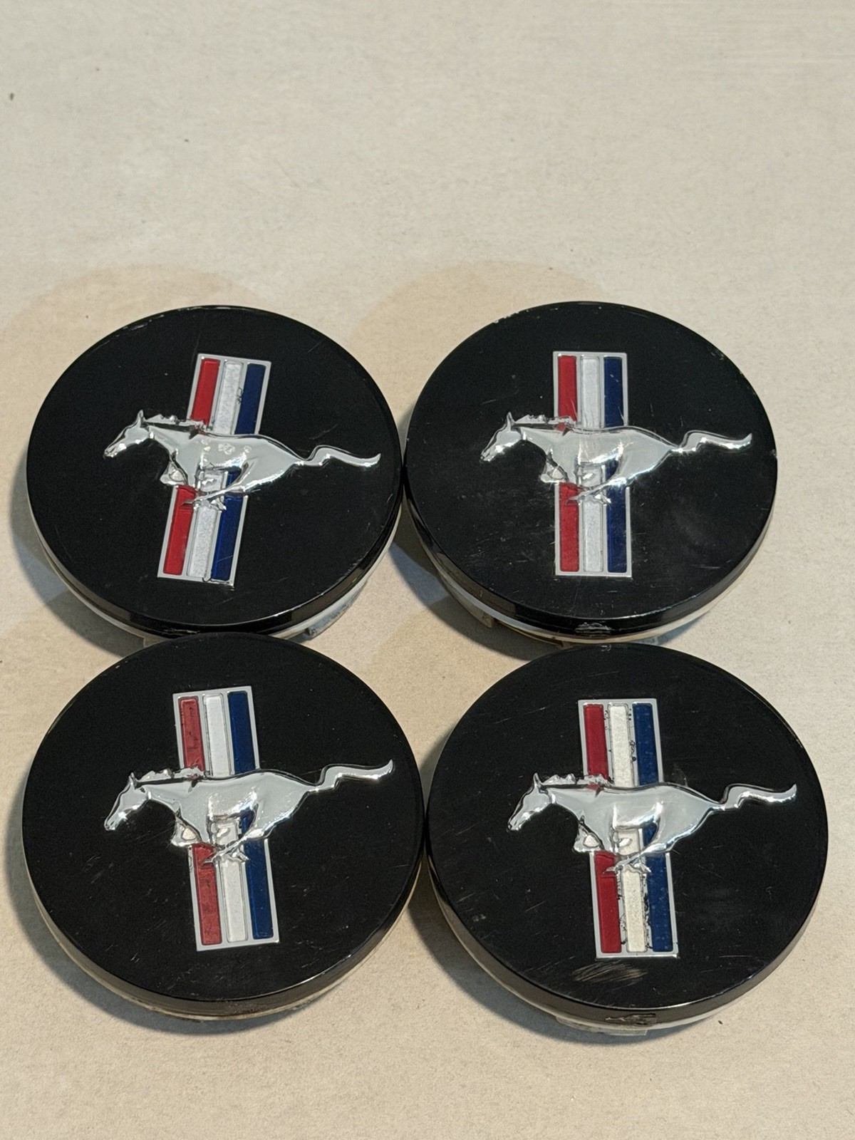1994-2004 Ford Mustang Bullitt Alloy Tri Bar Pony Center Caps 1994-2004 Ford Mustang Bullitt Alloy Tri Bar Pony Center Caps