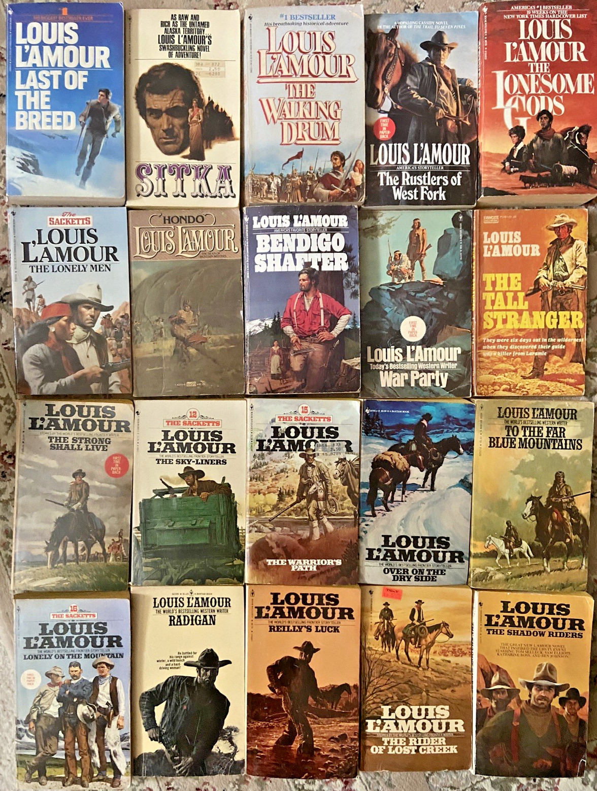 Lot of 80 vintage LOUIS L\'AMOUR Westerns Bantam Paperbacks Bantam Fawcett Sacket