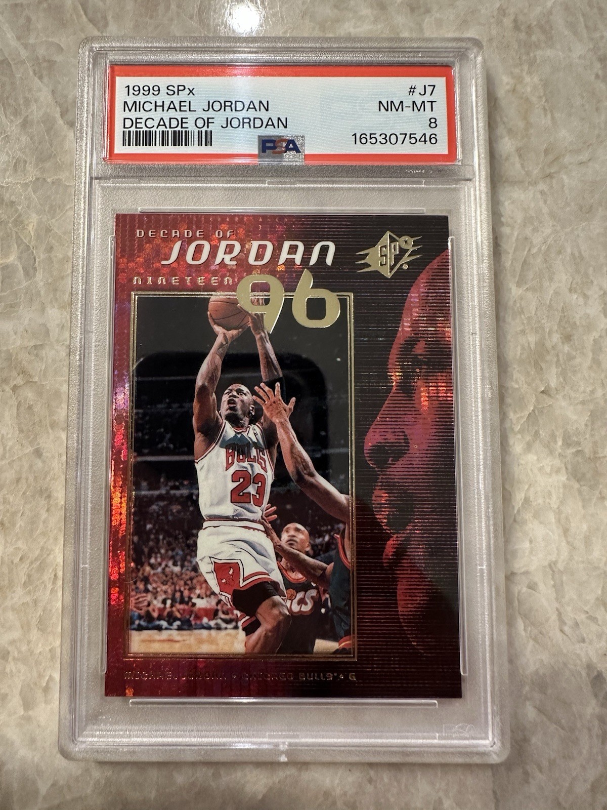 1999-00 SPx - Decade of Jordan Michael Jordan #J7 Chicago Bulls PSA 8 NM-MT Card 1999-00 SPx - Decade of Jordan Michael Jordan #J7 Chicago Bulls PSA 8 NM-MT Card